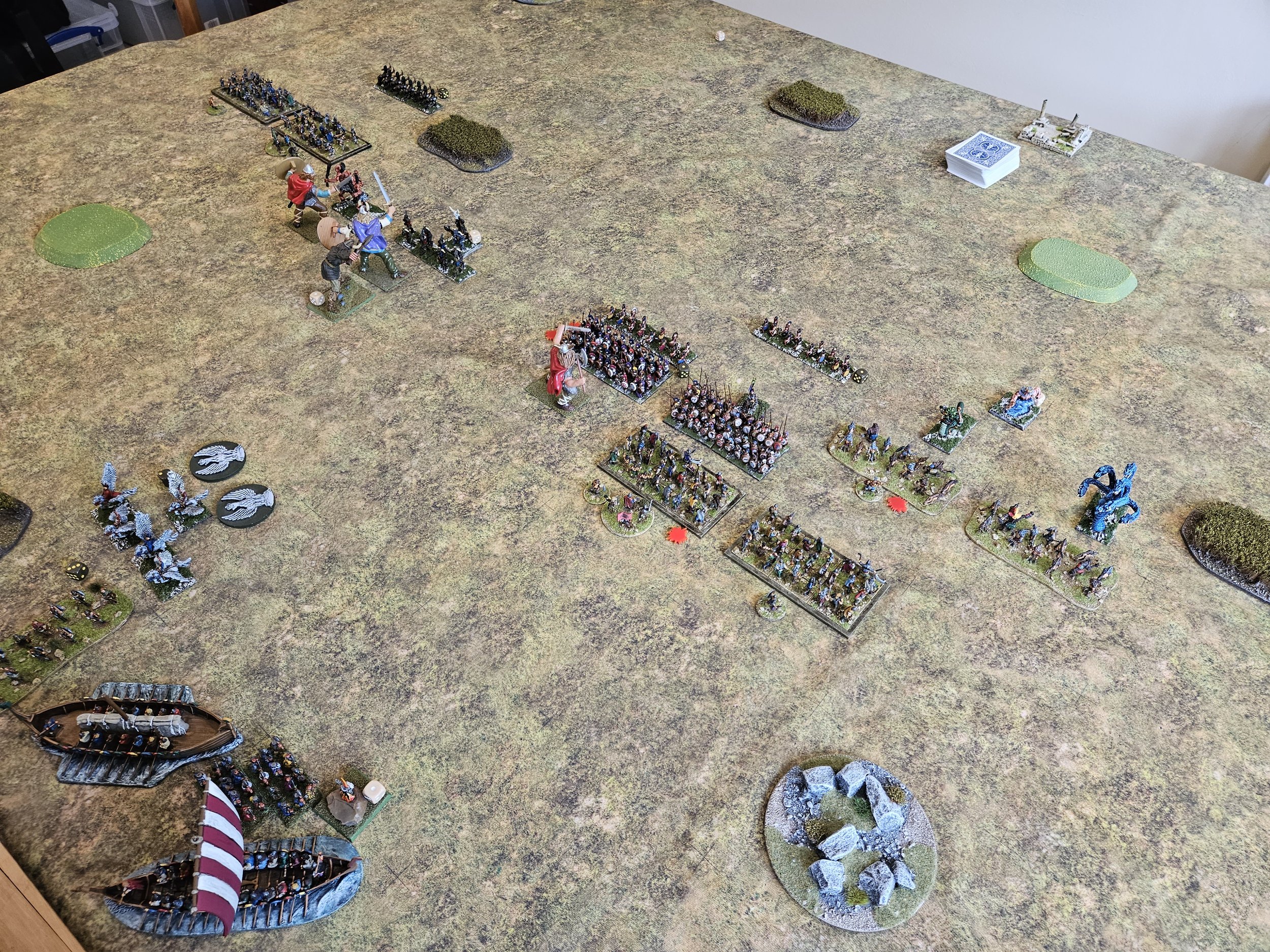  The Pegasus cavalry are hovering way over the enemy camp, waiting for the right moment to strike. A bit like paratroopers, they can take the empty Norse camp (the longboat without the sail) by swooping down into it before the Norse archers intervene
