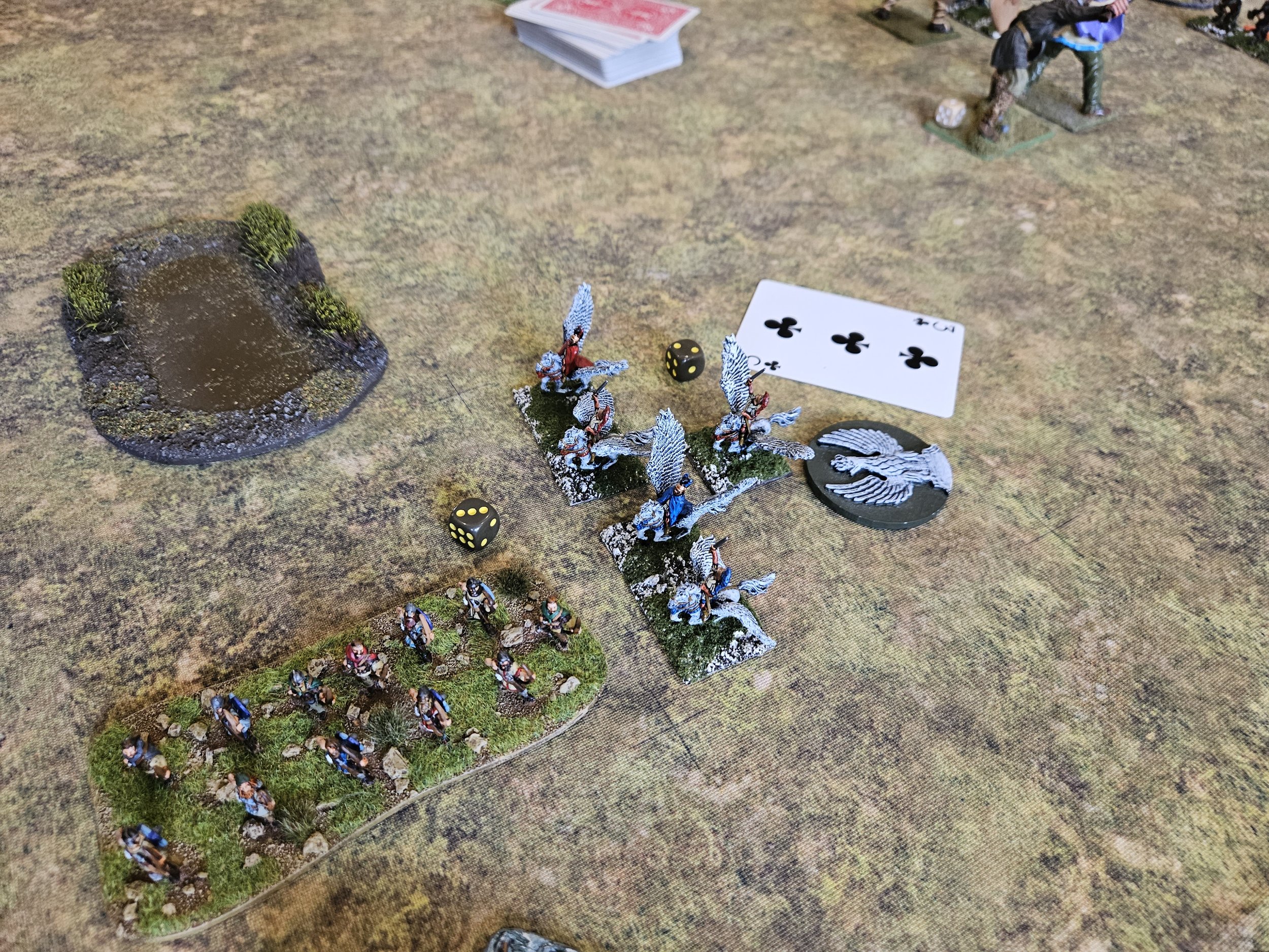  Meanwhile the Pegasus Cavalry have used a difficult activation to drop from “Up There” to “Down Here” and are about to throw some javelins at the flank of the Norse lights. 