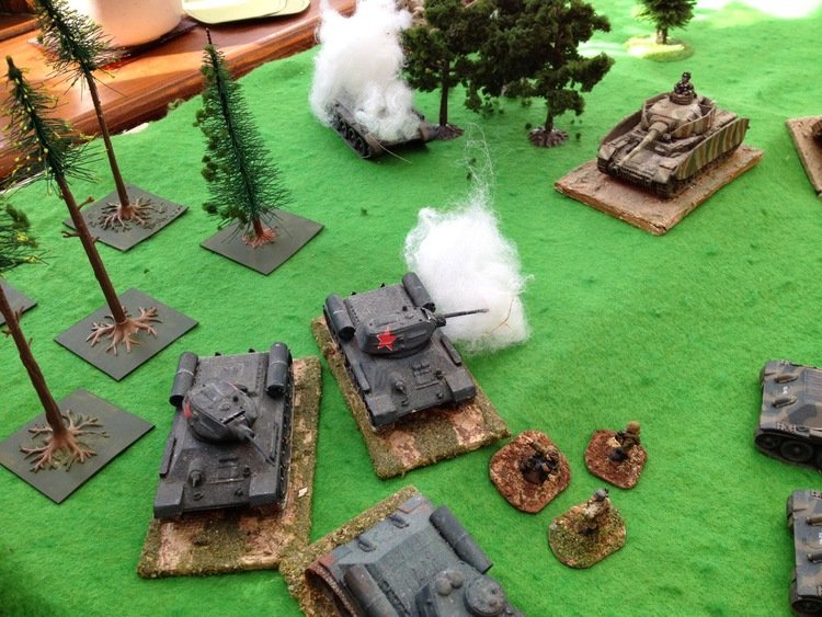 ...and promptly dispatched two more Soviet tanks which exploded, killing their tank-riding infantry too