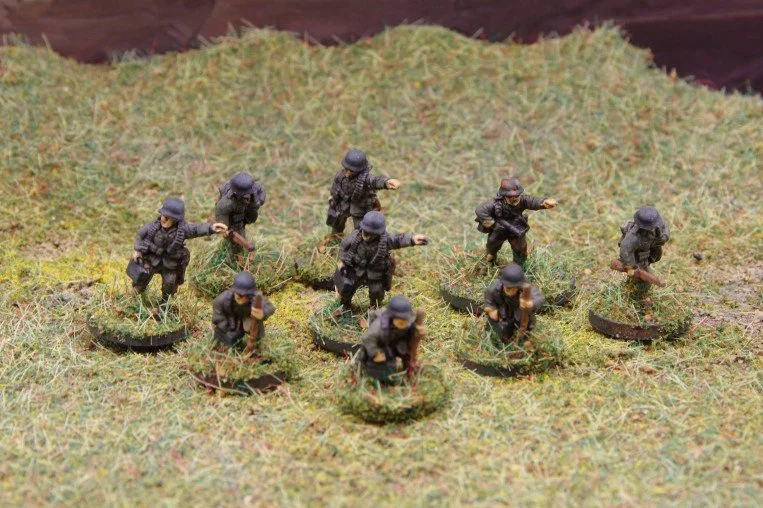 Senior leader with ammunition carriers.JPG