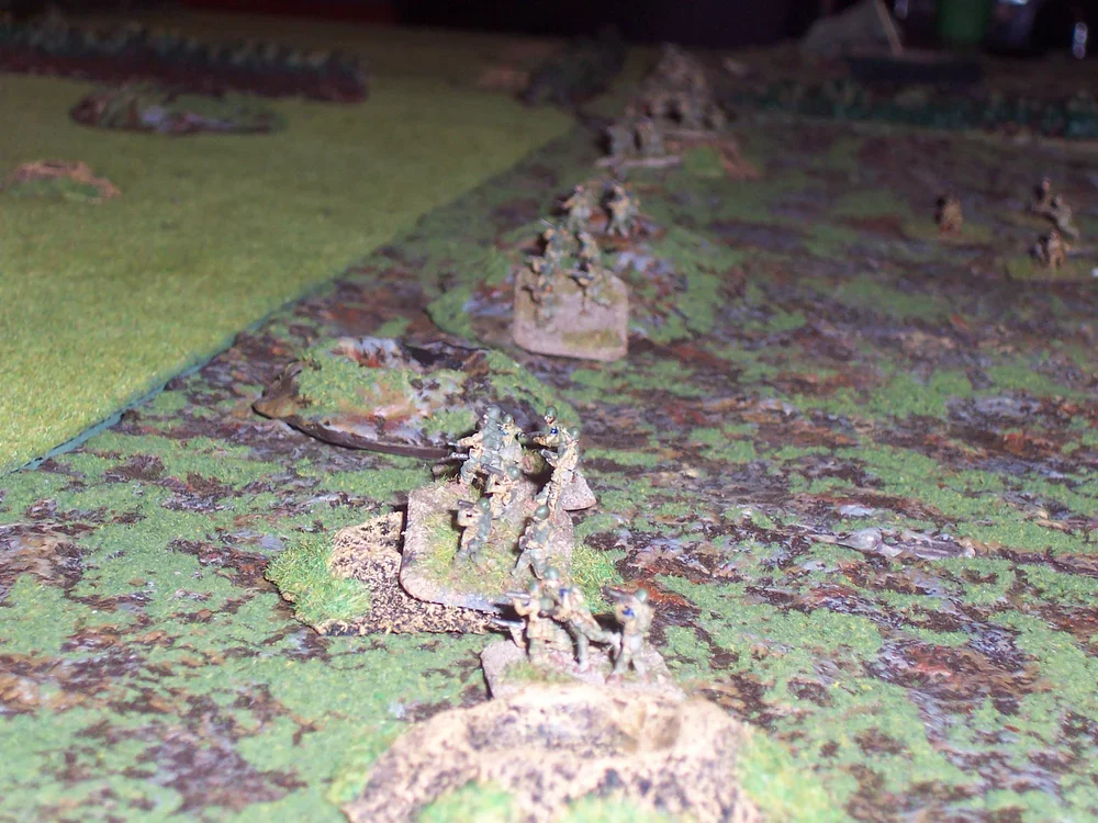  A German company is spotted moving from the south east. Rangers start to open fire, causing hits amongst the Grenadiers. Luckily the Rangers with some accurate fire take out the advancing German MG42 team. Eventually the Germans take cover in an aba