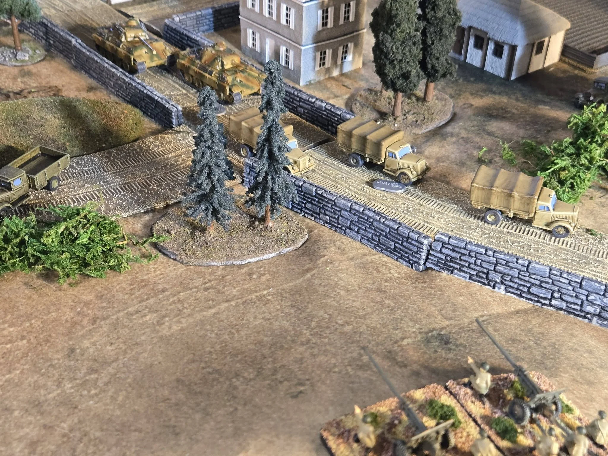 Dug-in Zis-3 guns open fire from atop the hill