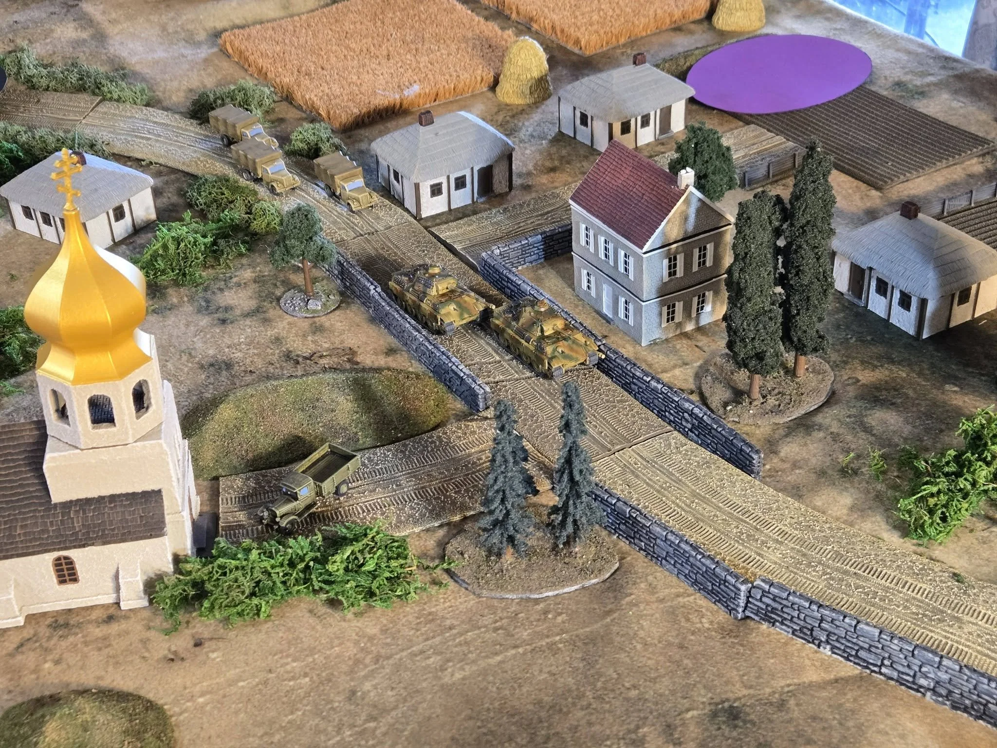 The first German forces begine to arrive, unaware of the Soviet forces who are hiding in the church and dug in along the river banks