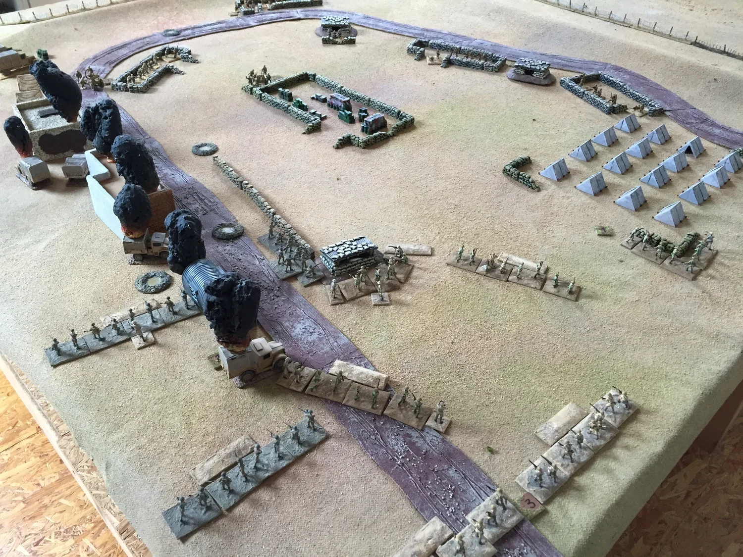 British infantry (left) enters the Italian camp, previously bombarded by British artillery
