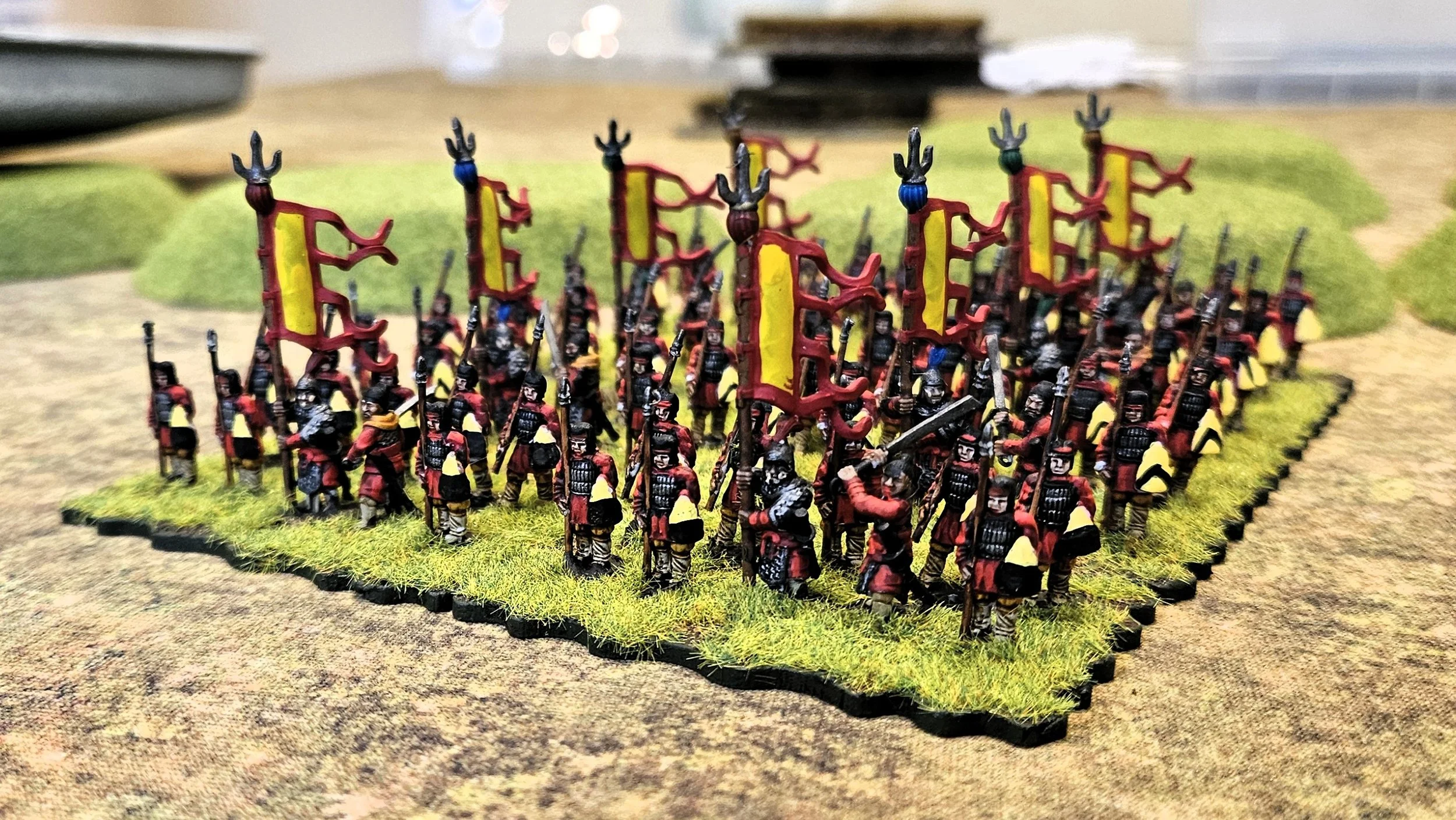  Four units of Han Chinese spearmen (or eight units if playing on a 10cm grid)  Lurkio 15mm via Gripping Beast with command and standard from Ten Kingdoms’ Song range via Micks Bits on Etsy. 