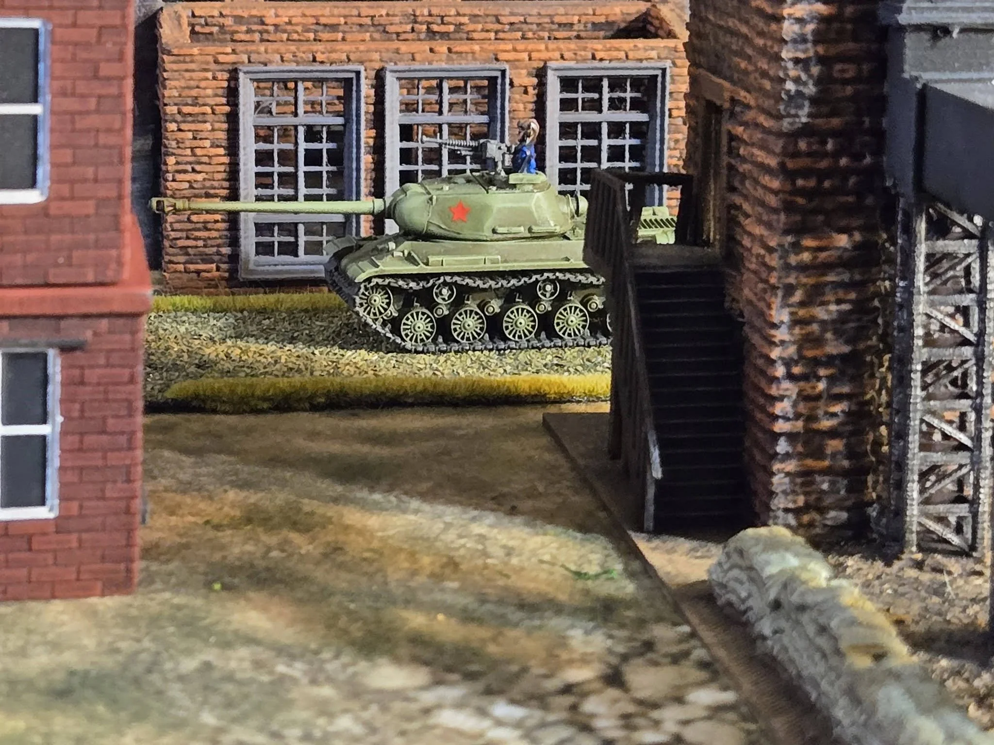  The IS-2 moves on, hunting the other Stug IVs reported in the town. 