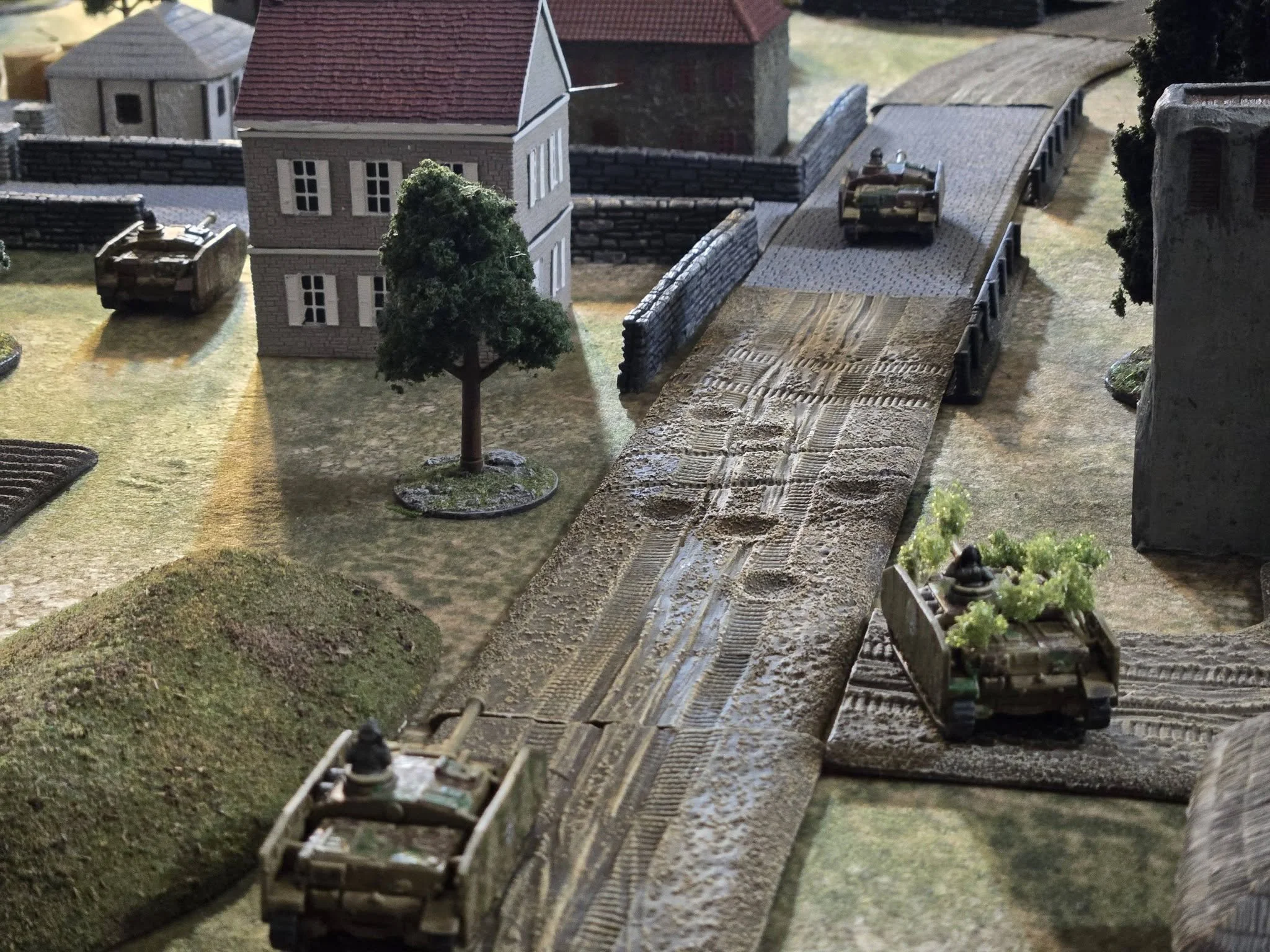  A Stug IV zug cautiously advances into the town. 