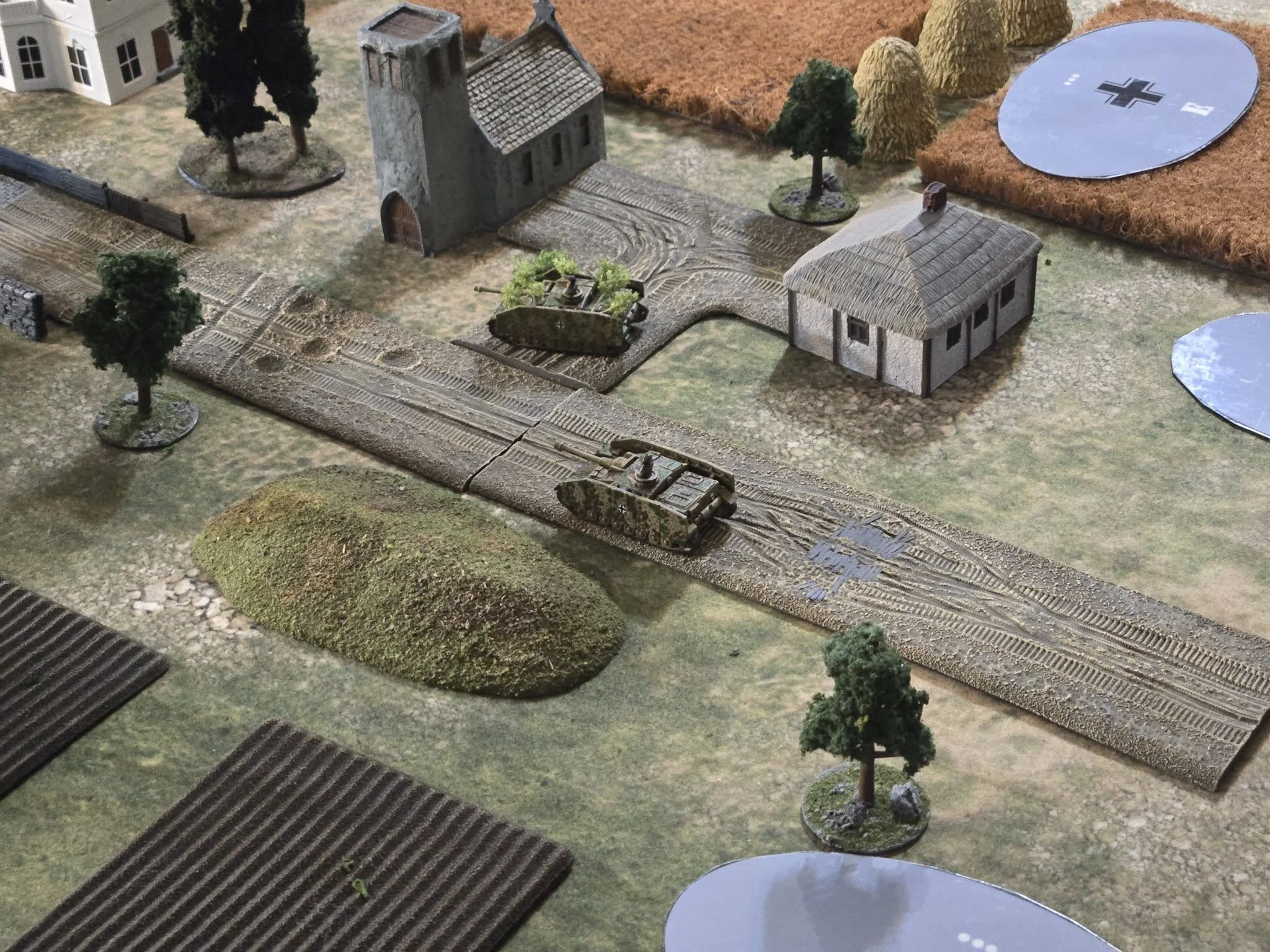  No enemies in sight, the Stug IVs continue forward. 