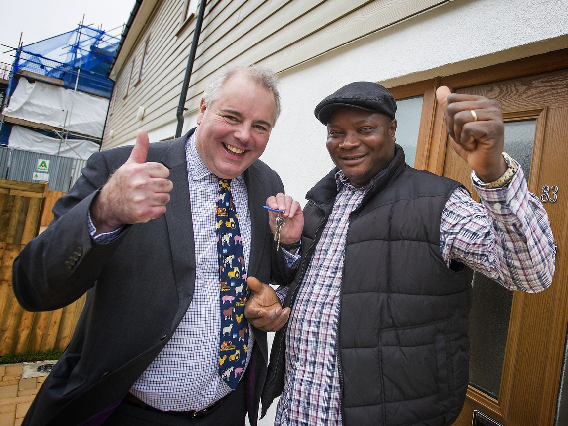 Richard Bacon MP hands over the keys to proud Home Partner George Anyakwo