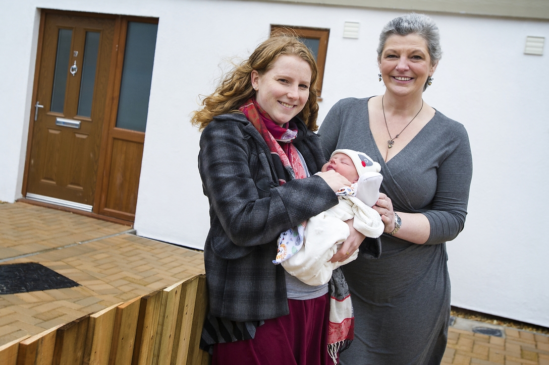 Cllr Ann O'Byrne, Liverpool City Council Cabinet Member for Housing and Community Safety with Home Partner Hannah Jones and baby Percy