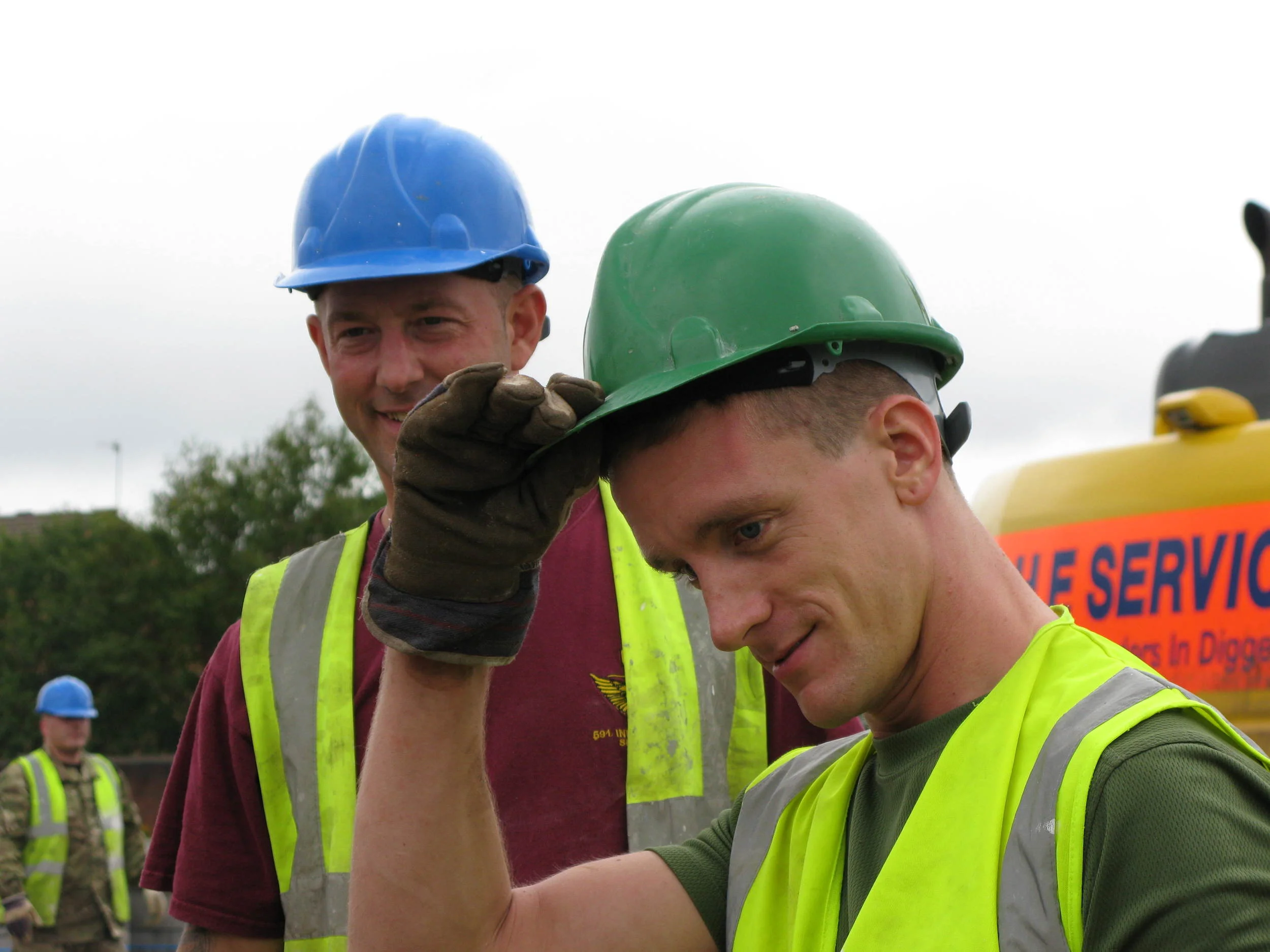 Volunteers help build homes