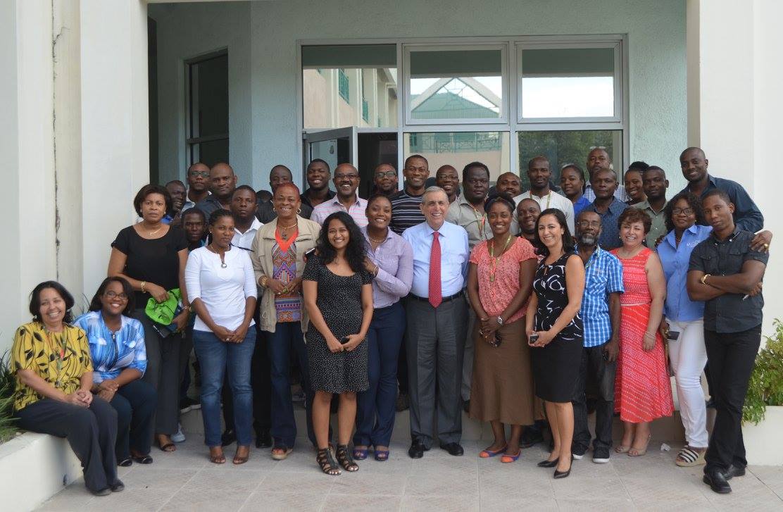 John Sanbrailo and staff outside the offices of PADF Haiti in Port-au-Prince.