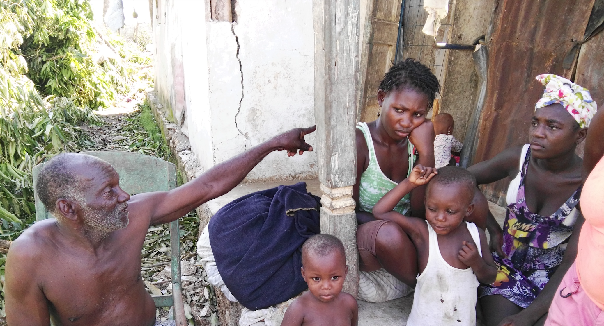Joseph St. Fort and his neighbors in Camp Perrin, Haiti. (Jeanty Junior Augustin)