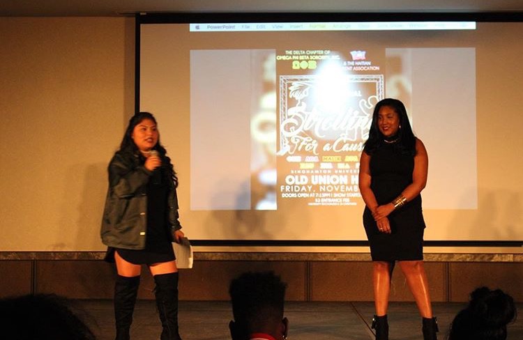 Maritza Minchala, president of Omega Phi Beta Sorority (left) and Chelsea Lindor, president of the Haitian Student Association. kick off the show.