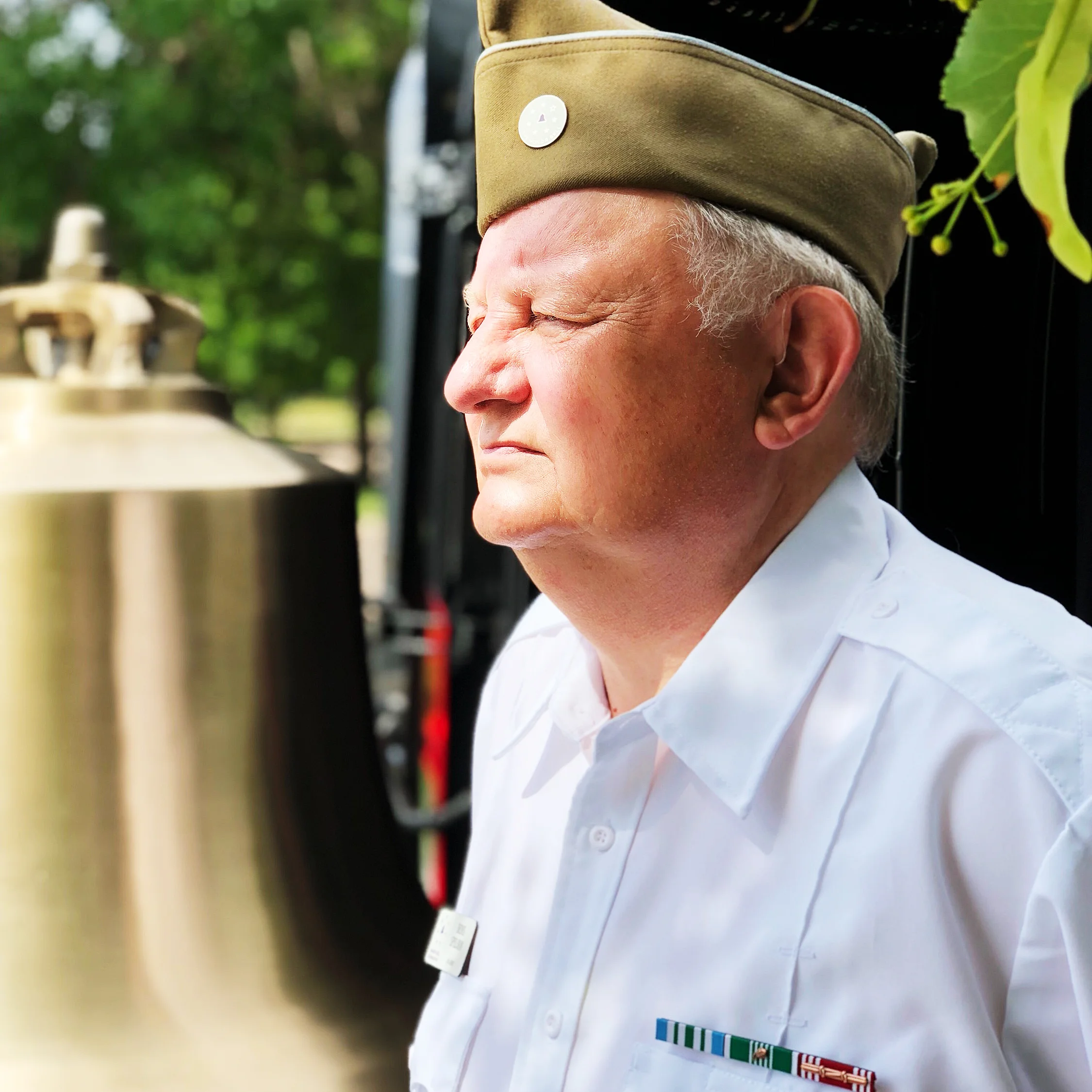 Vietnam veteran Denis Spelman does double duty at Fort Logan by volunteering at the Public Information Center and tolling the Honor Bell.