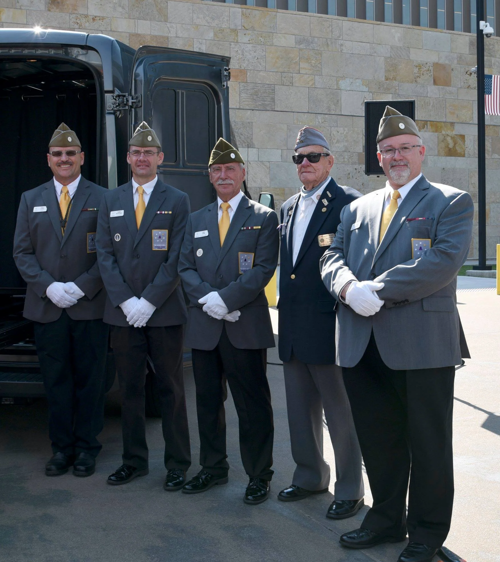 Bell Guards Tracy Turner, Daniel McCutchon, and Greg Kuhn with Christopher Nielsen and Bell Guard Dean Brown.