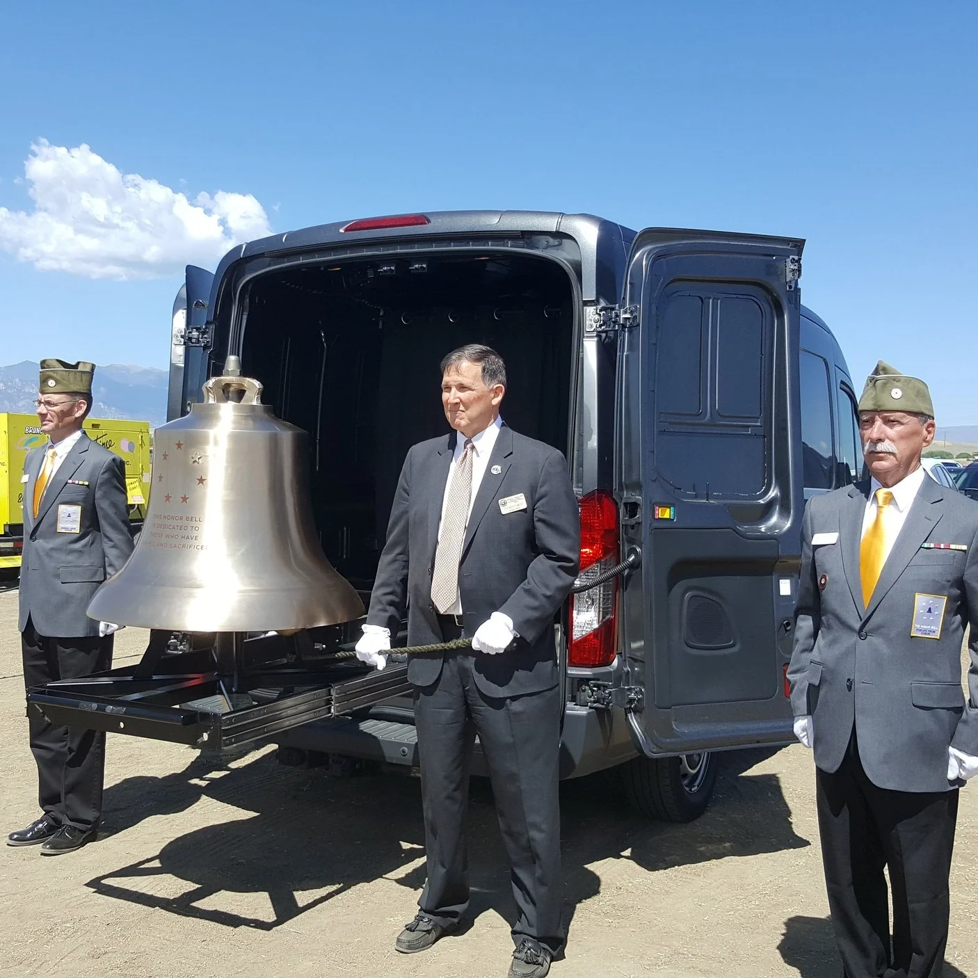 Steve Best, center, tolling Bell Honors at the Groundbreaking for the Pikes Peak National Cemetery in May, 2018