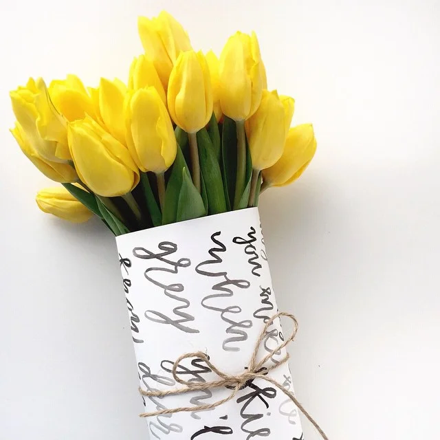 We were thrilled to be featured in the May 2015 issue of Martha Stewart Living on pg. 6 as the Instagram Favorite of the month! We used modern calligraphy brush lettering on floral wrap paper with the lyrics to "You Are My Sunshine". I think I should decorate all future bouquets in lyrical wrap from here on out!