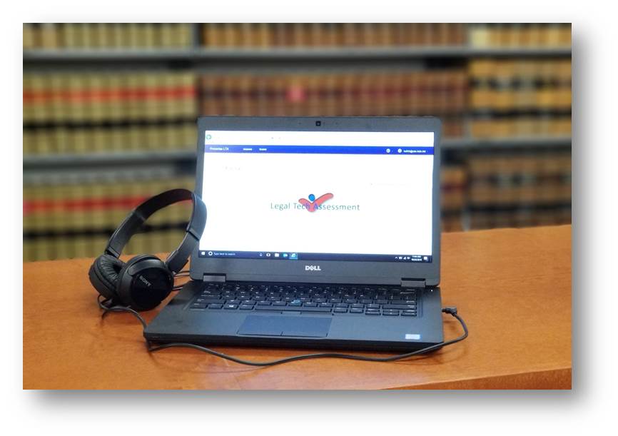 Harris County Law Library training laptop with Legal Tech Assessment logo