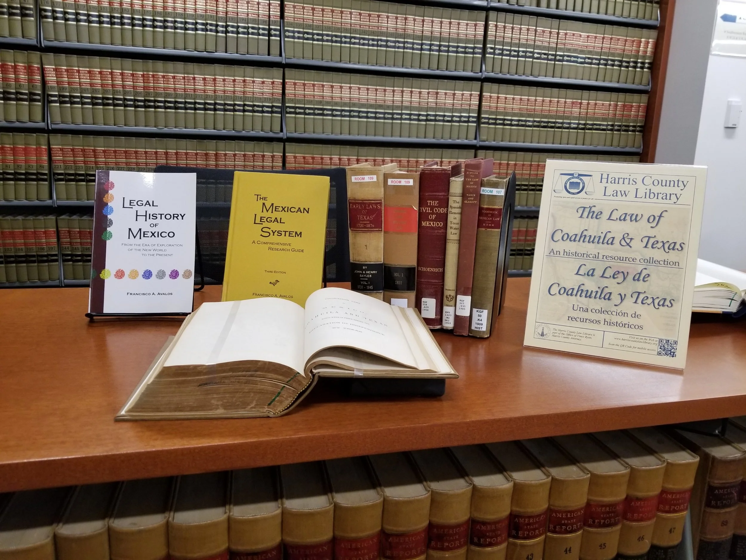Photo of exhibit featuring the Harris County Law Library’s The Law of Coahuila and Texas : An historical resource collection.