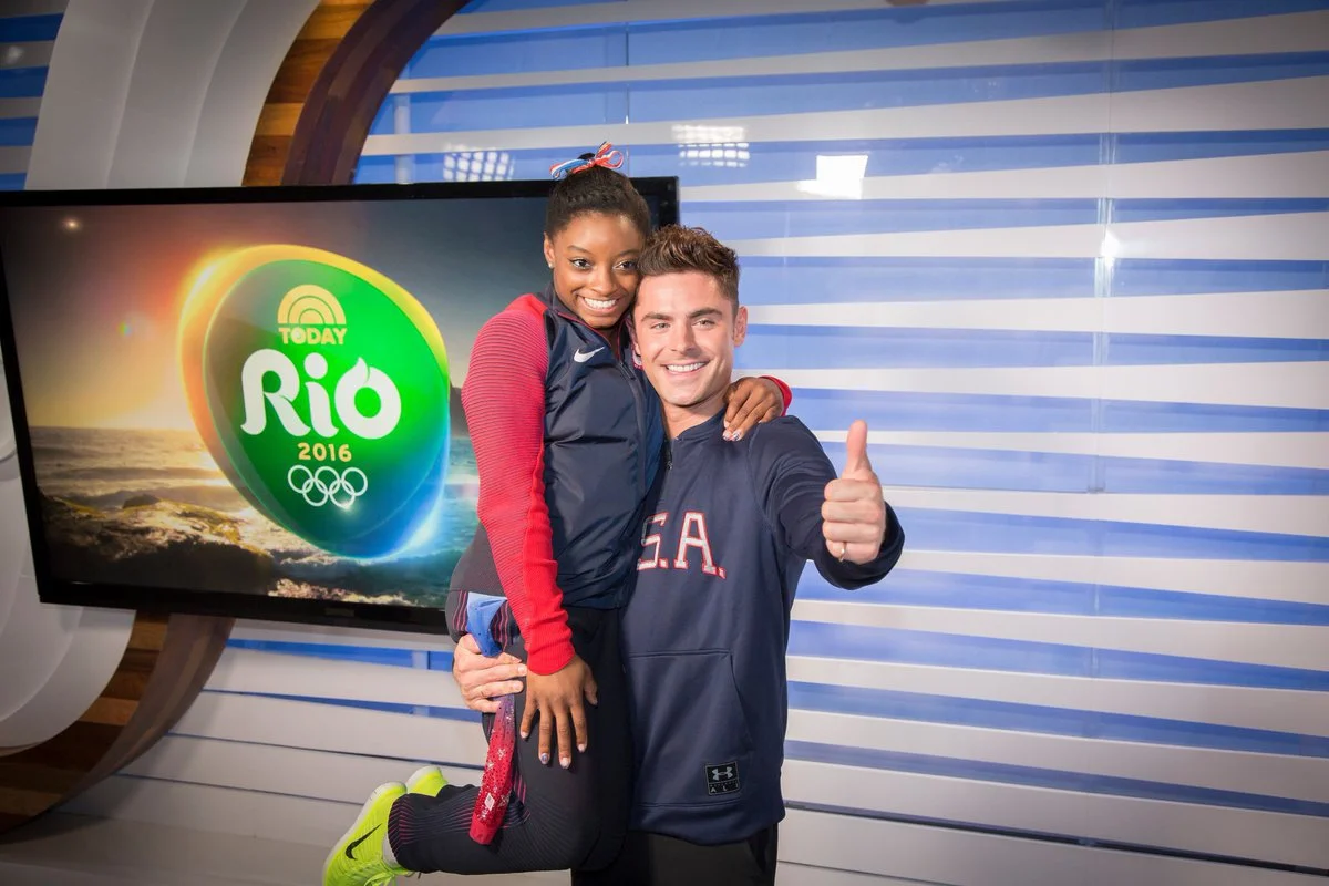 NBC Sports' Insert Studio at the 2016 Rio Olympics with Zac Efron and Simone Biles posing for a photo for social media