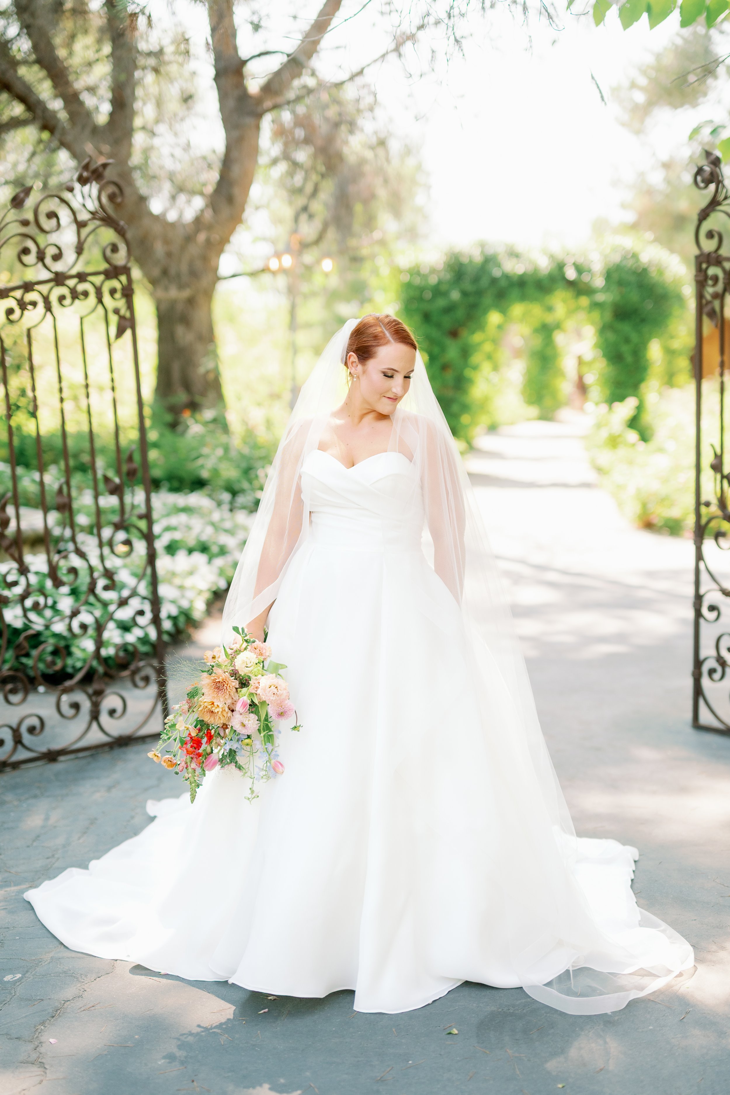 Outdoor wedding bride portraits at a lush garden venue in Southern California