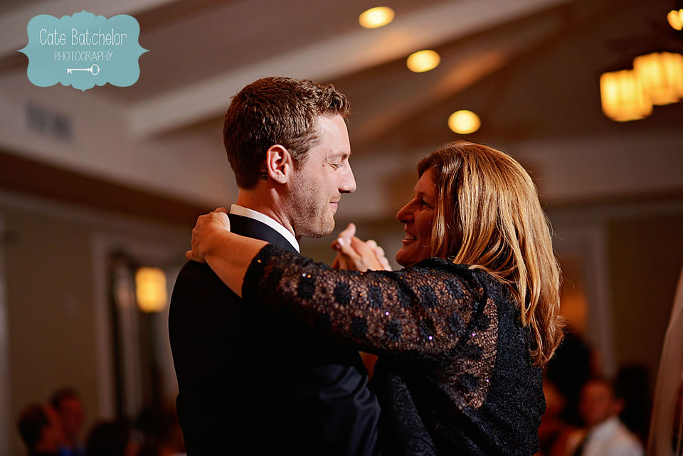 Mother and son dance.