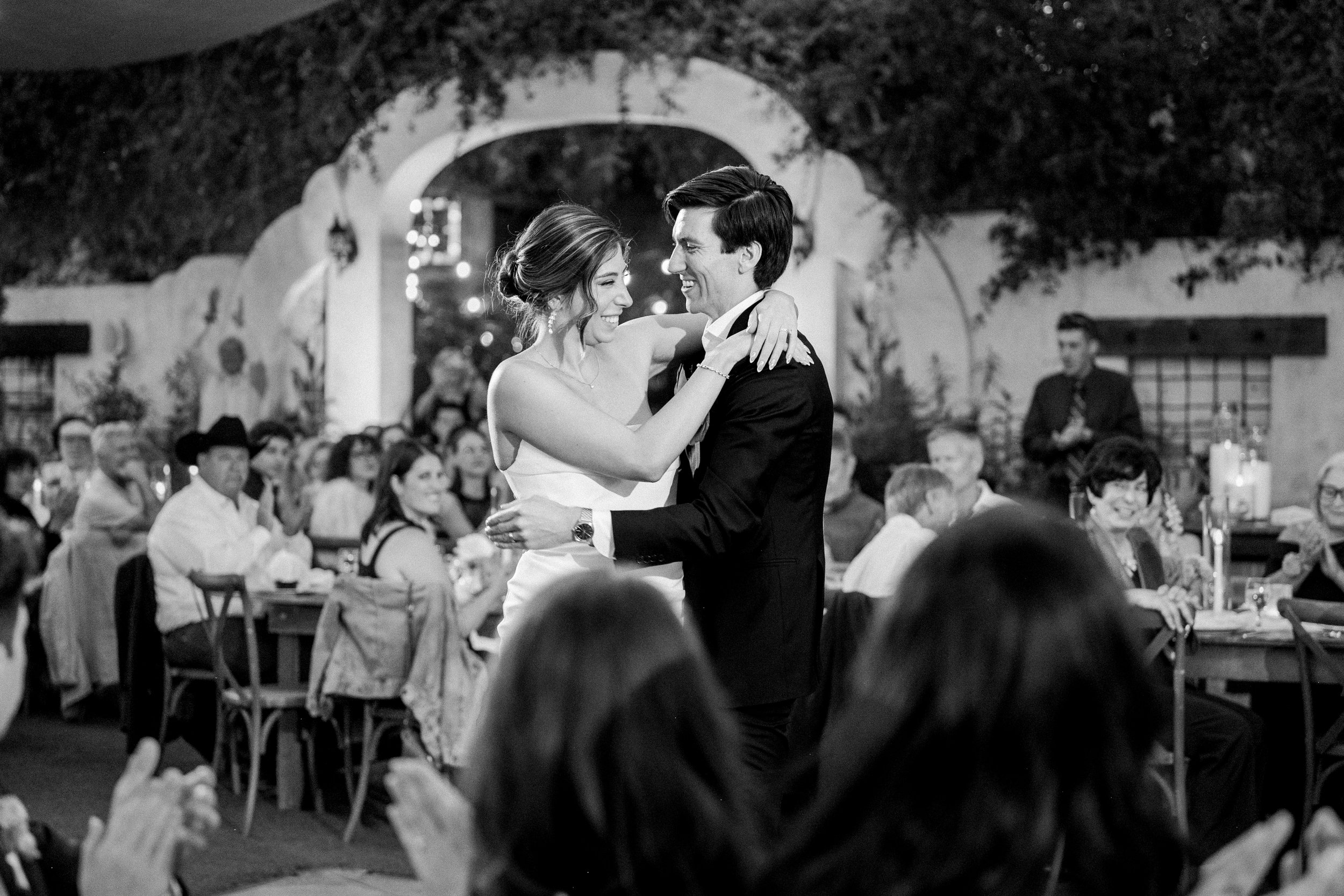 Bride and groom sharing their first dance at Tivoli Italian Villa wedding reception in Escondido, California