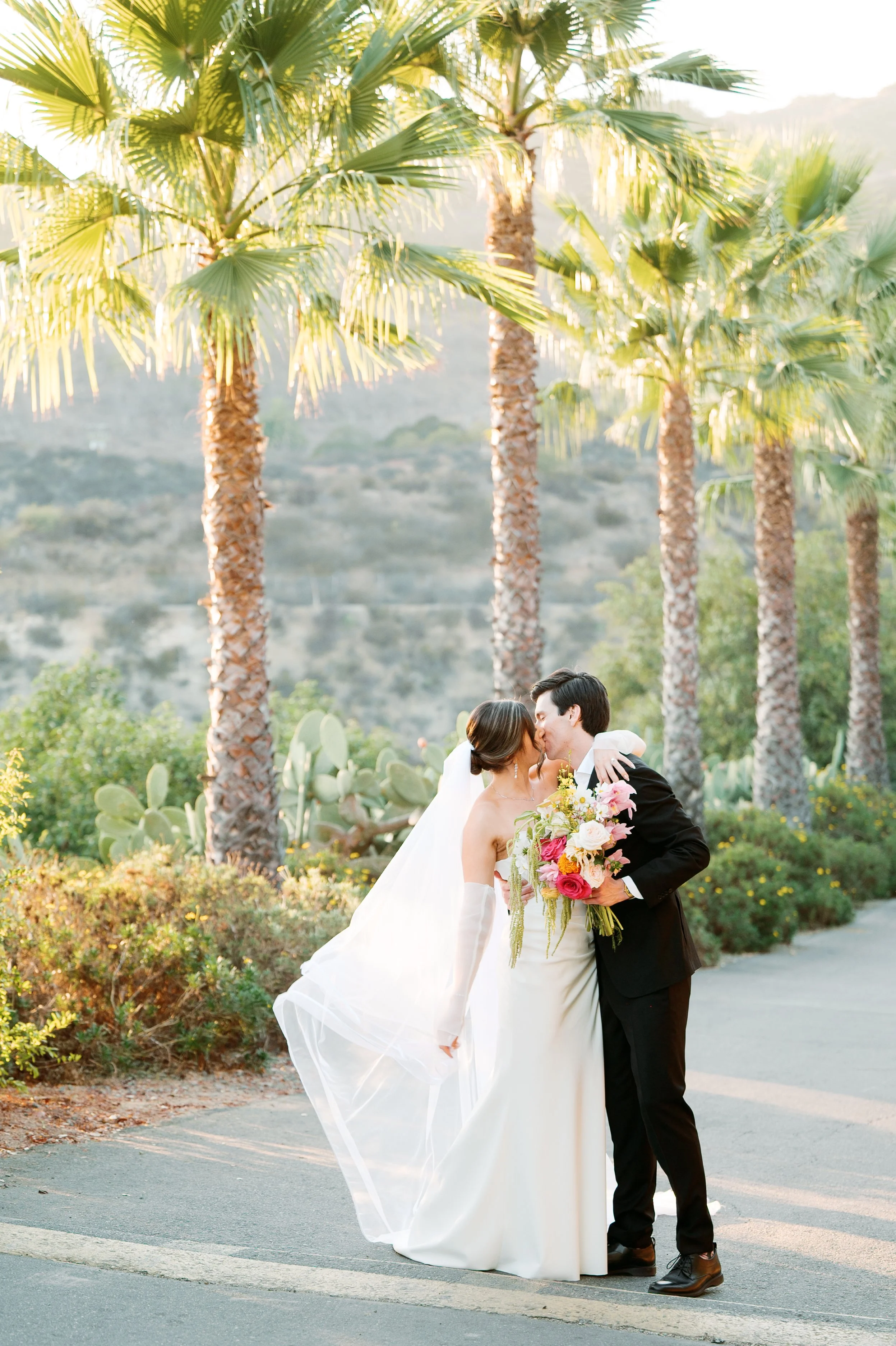 Bride and groom during golden hour portraits at Tivoli Italian Villa in Escondido, California