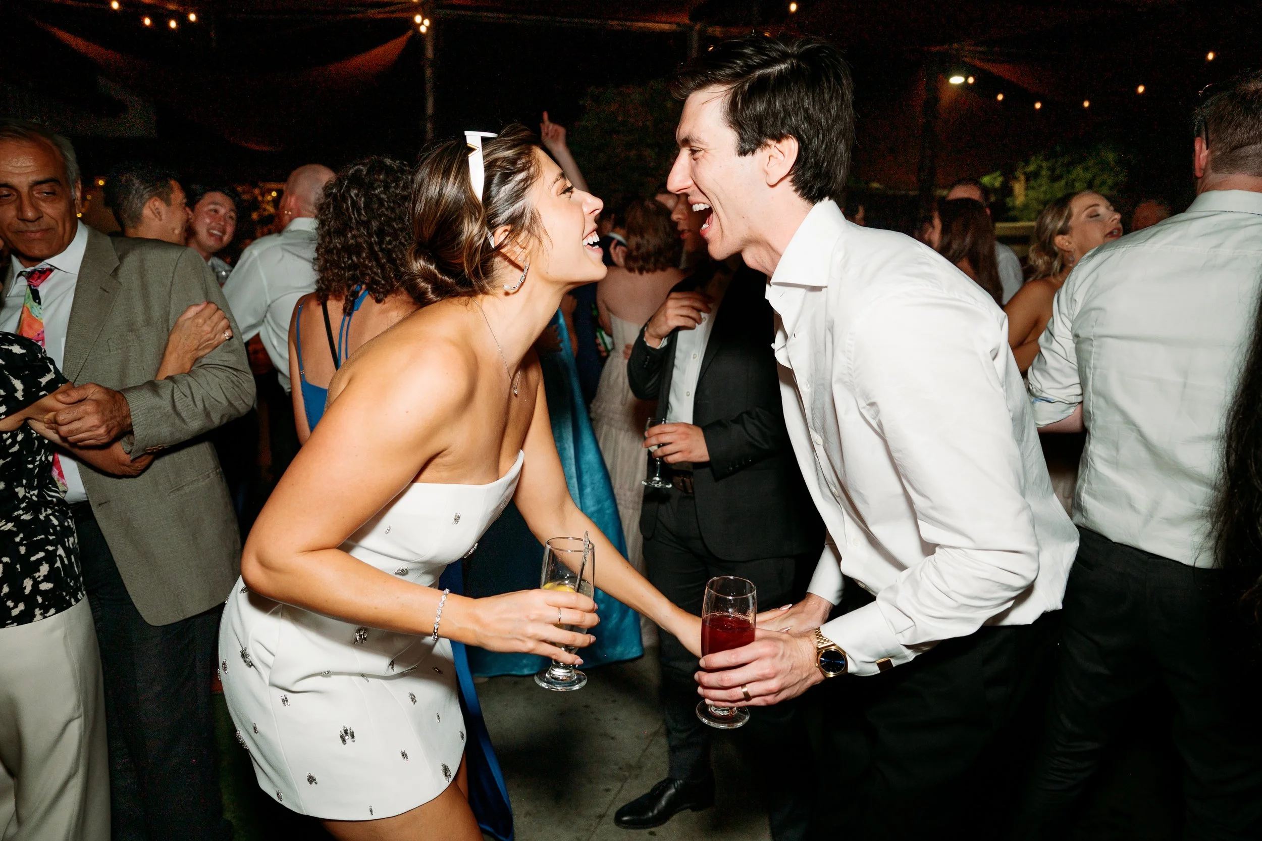 Bride and groom dancing on the reception dance floor at Tivoli Italian Villa wedding in Escondido, California
