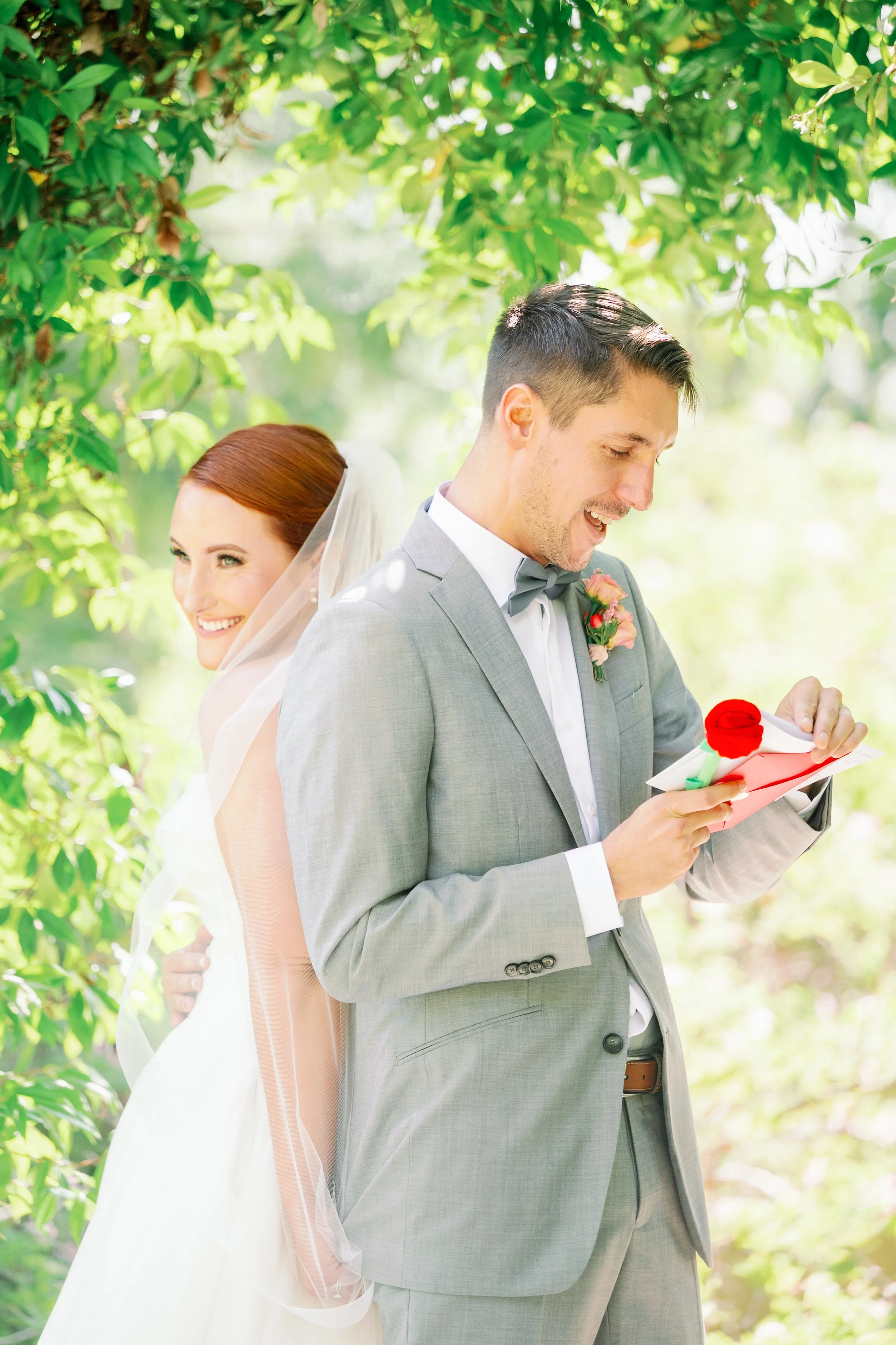 Couple sharing personal vows at Ethereal Gardens wedding venue in Escondido