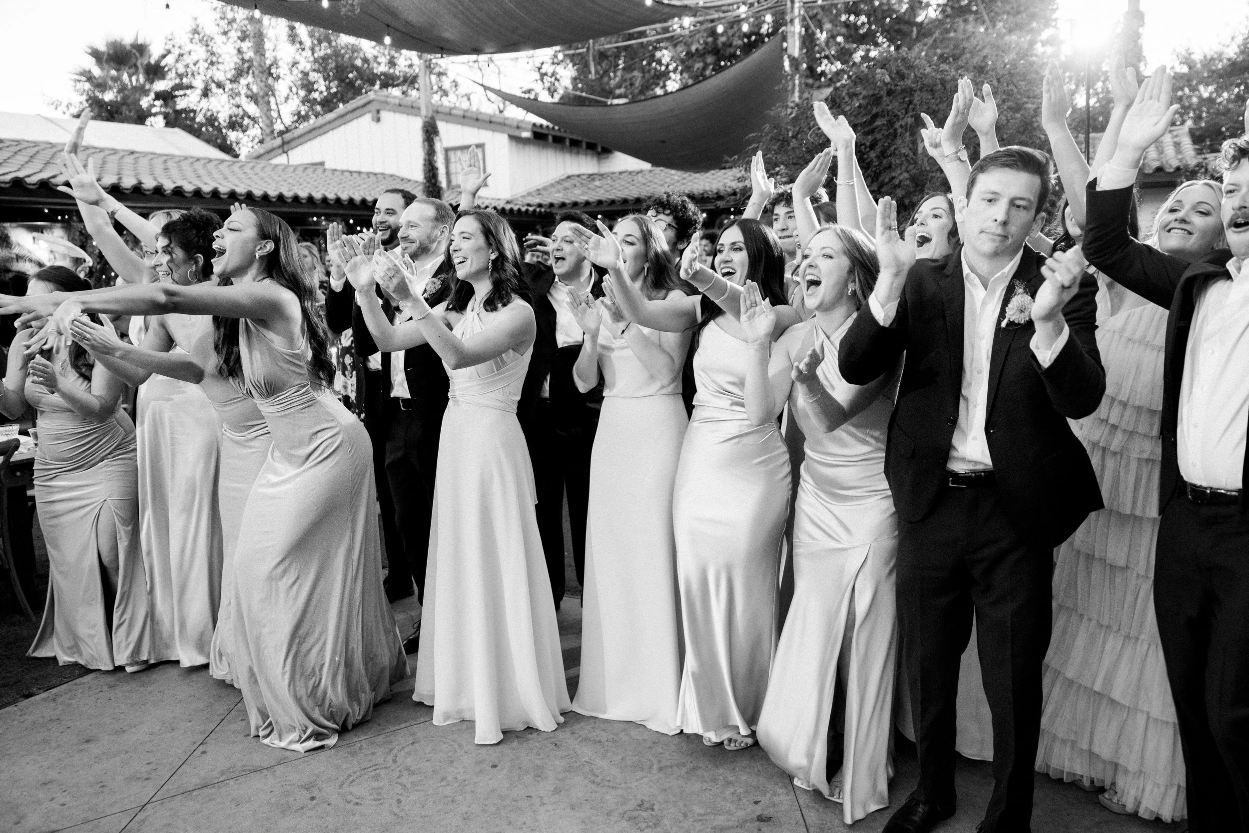 Bride and groom making their grand entrance at Tivoli Italian Villa wedding reception in Escondido, California
