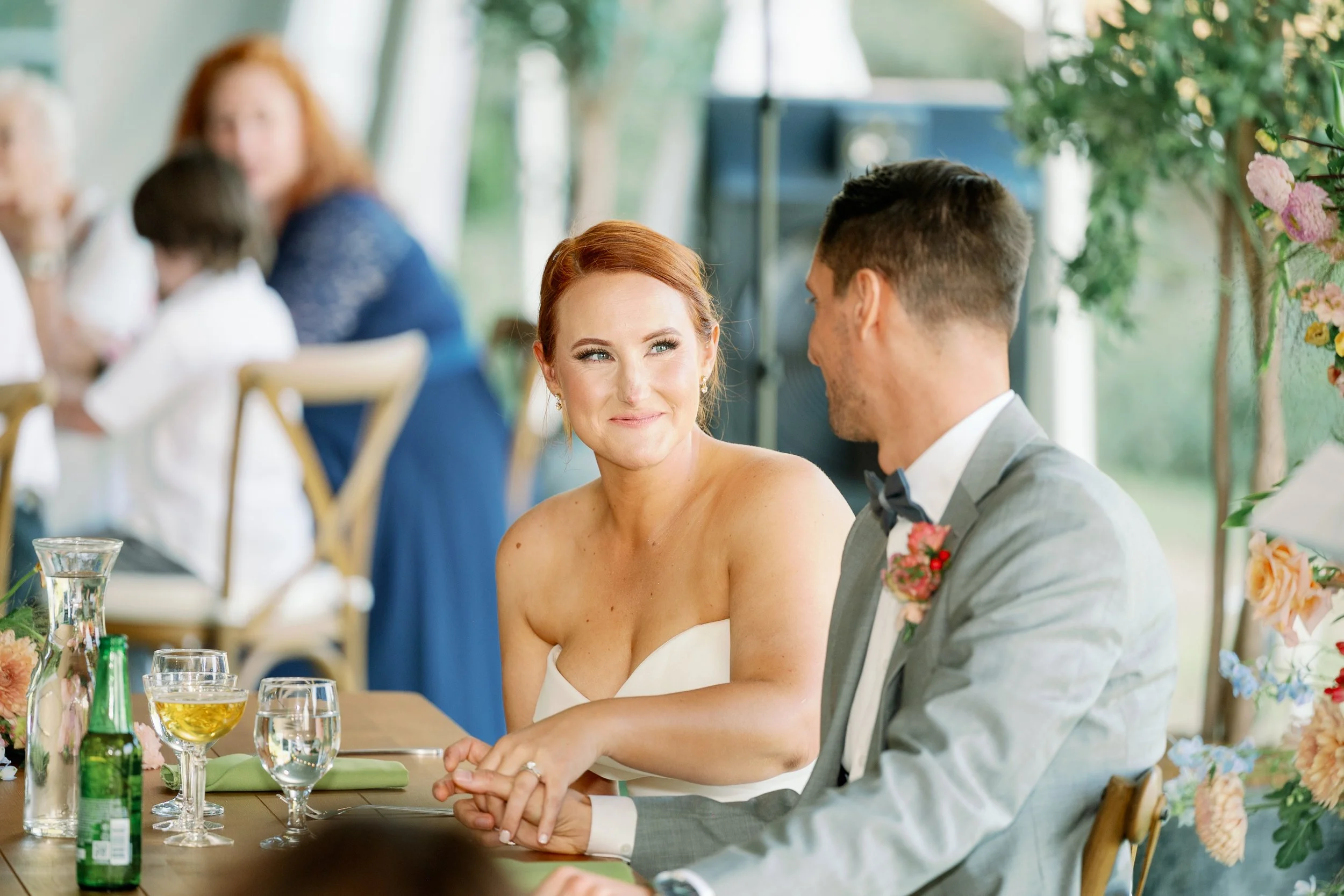 Emotional speeches during a garden wedding reception