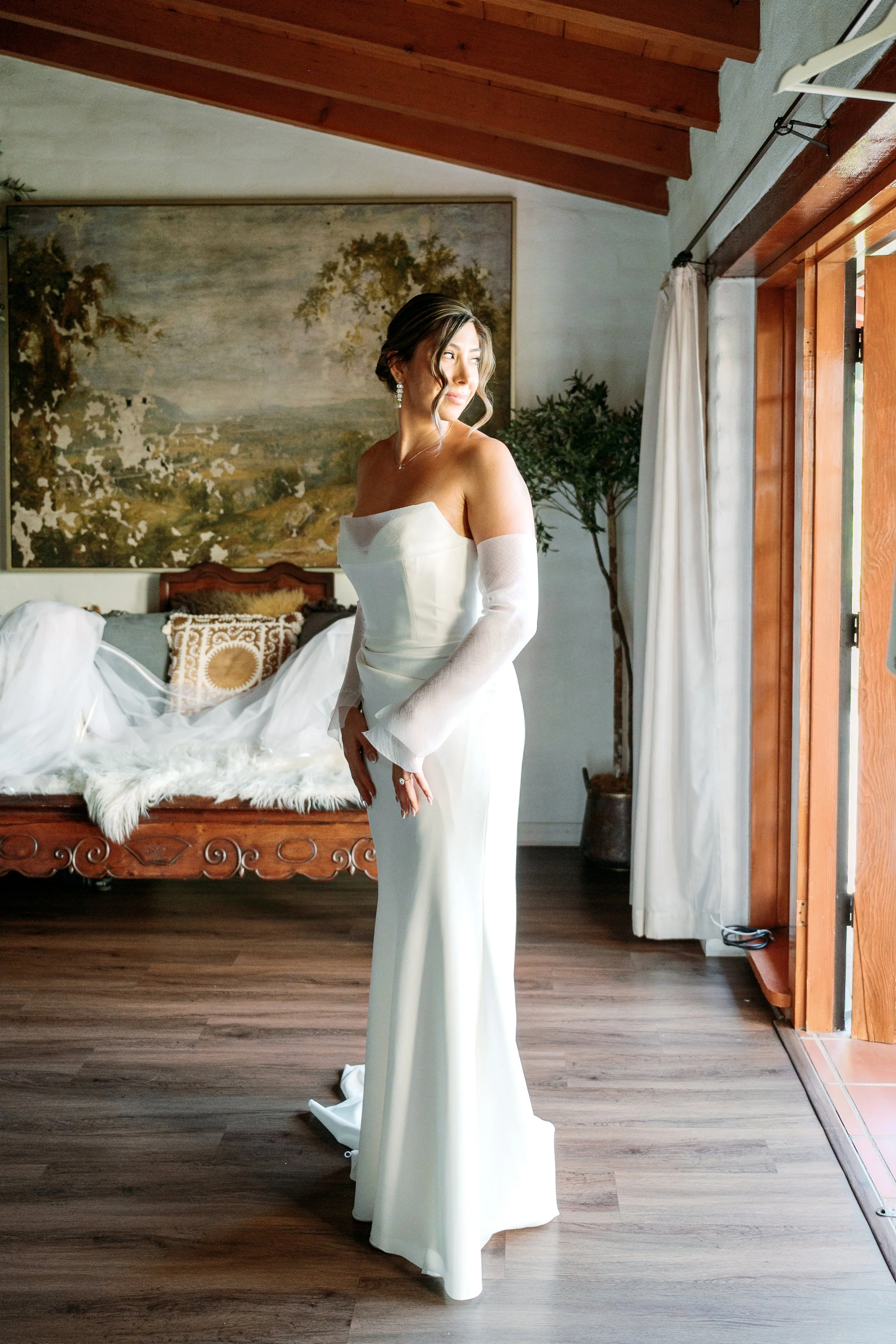 Bride getting ready at Tivoli Italian Villa in Escondido with soft window light