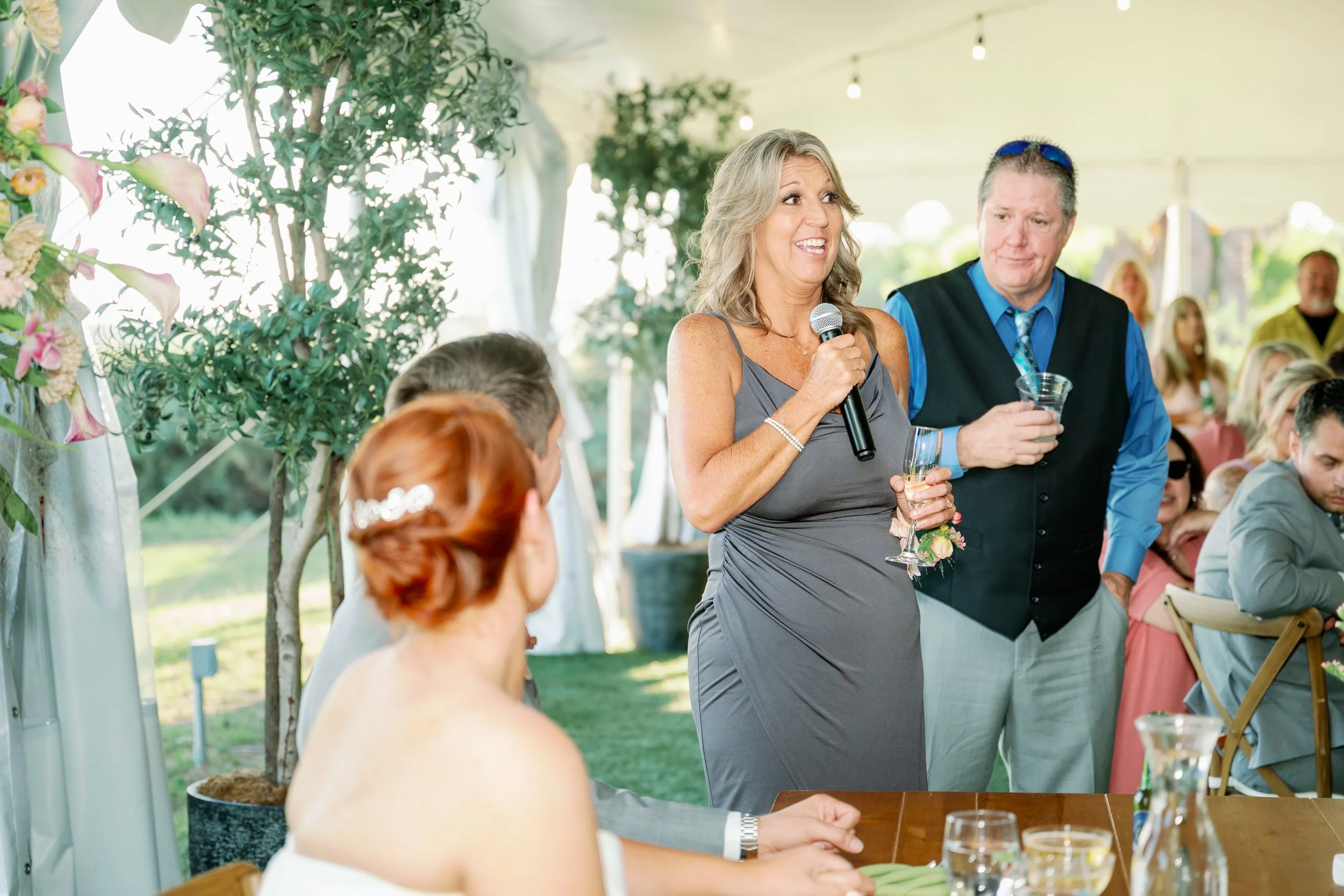 Guests giving wedding toasts at reception in Escondido California