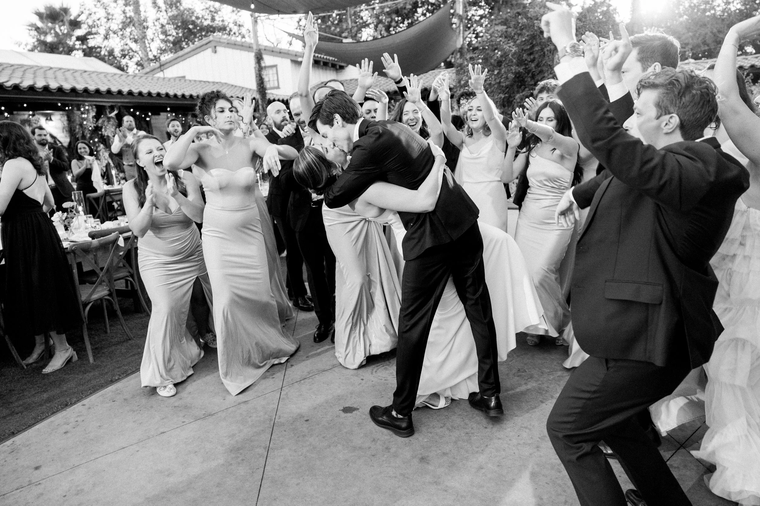 Bride and groom making their grand entrance at Tivoli Italian Villa wedding reception in Escondido, California