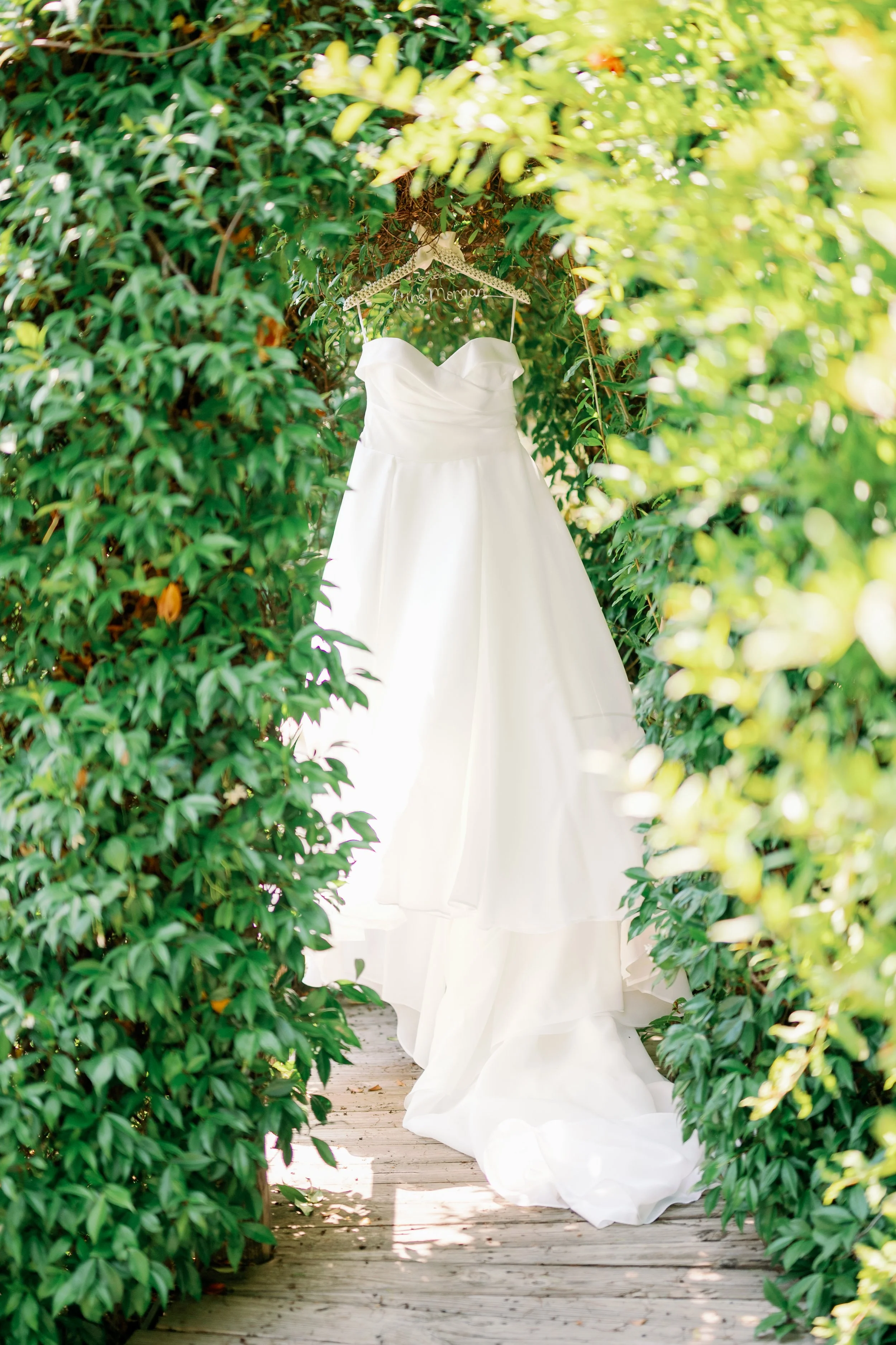 Bride dress hanging at Ethereal Gardens wedding venue in Escondido California