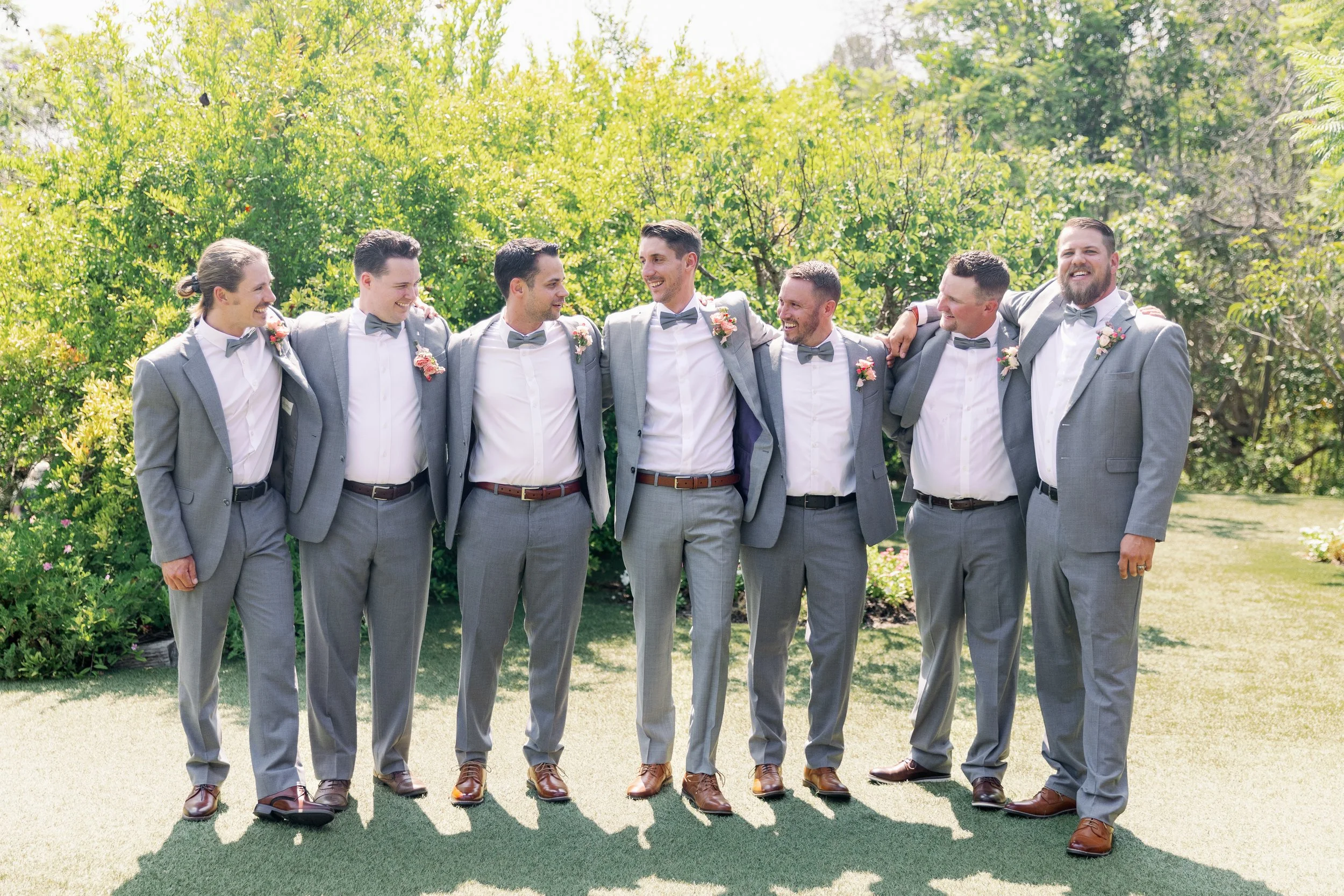 Groomsmen posing outdoors at Ethereal Gardens in Escondido