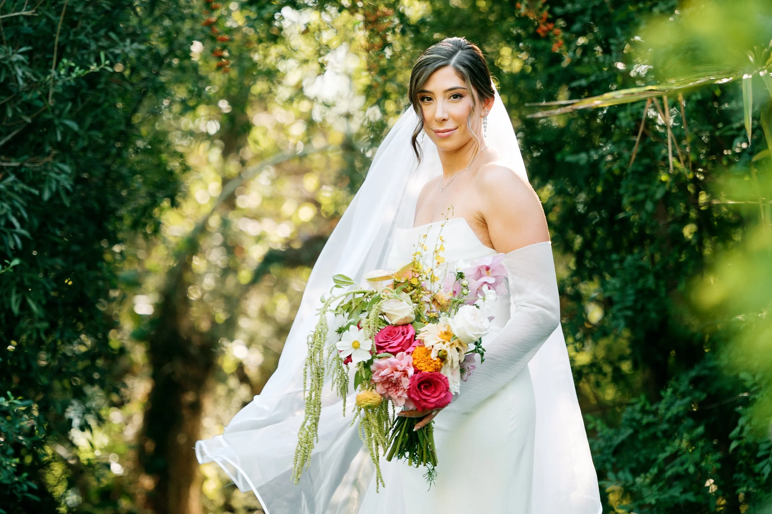 Bride holding her bouquet during wedding portraits at Tivoli Italian Villa in Escondido, California