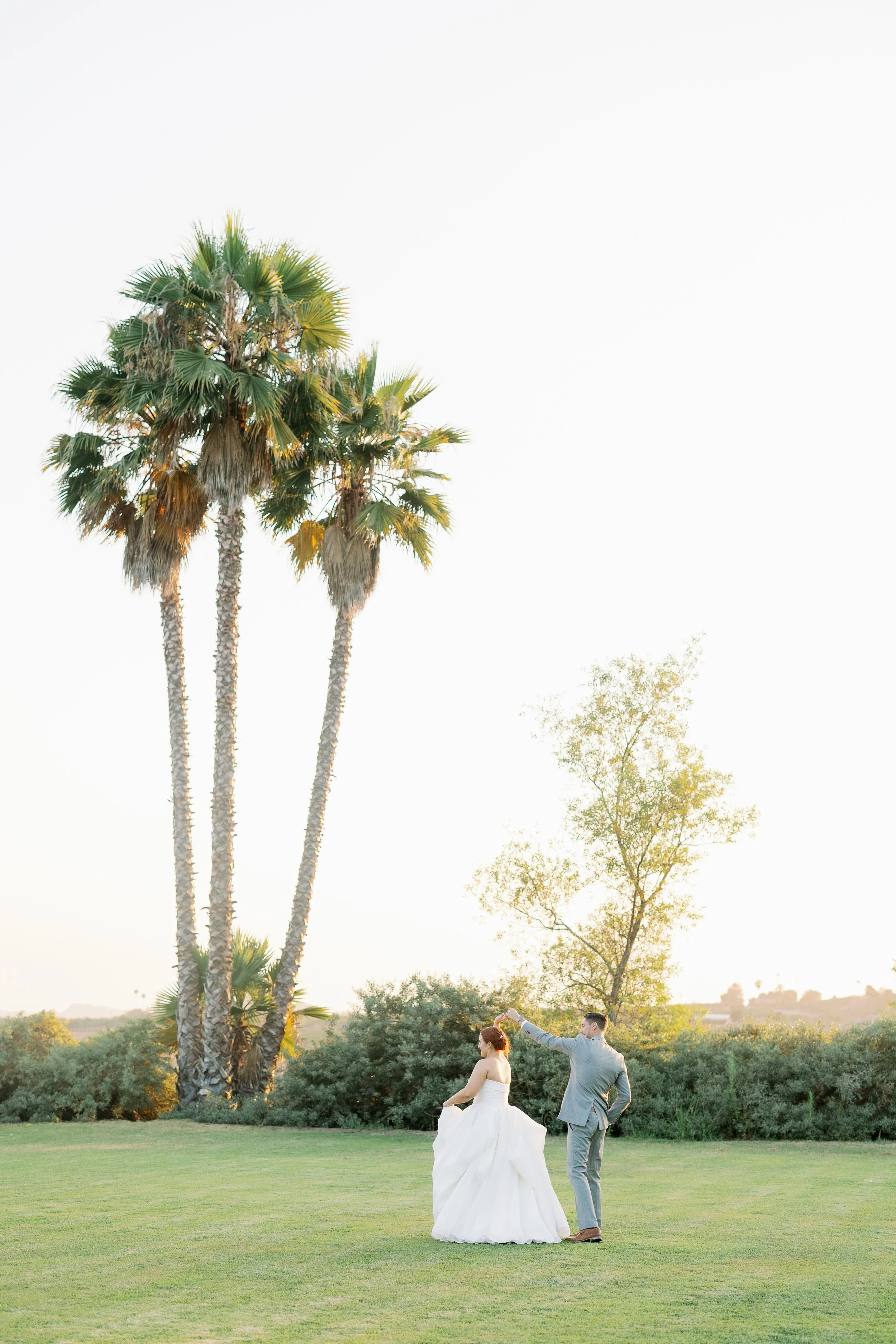 Couple photographed at sunset in a garden wedding venue in San Diego