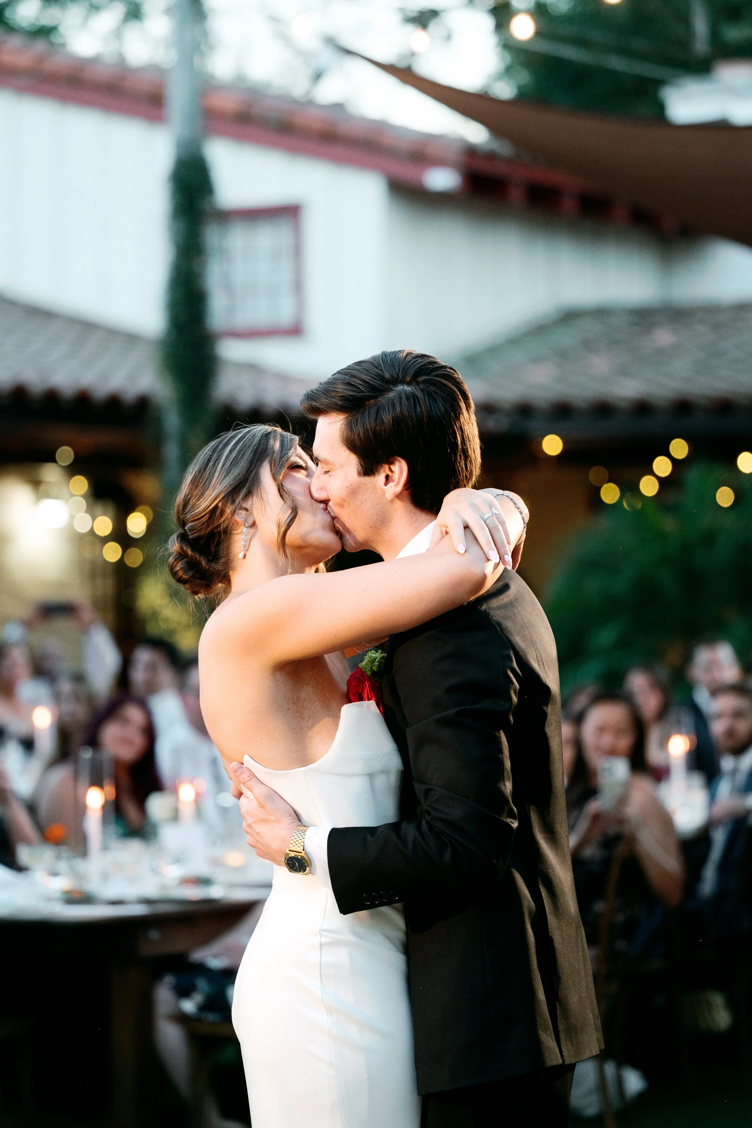 Bride and groom sharing their first dance at Tivoli Italian Villa wedding reception in Escondido, California