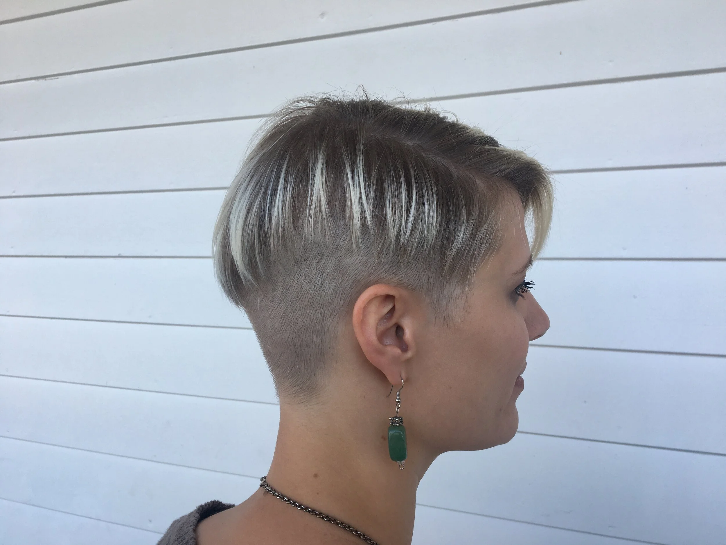 Short stacked blonde grow out shaved undercut