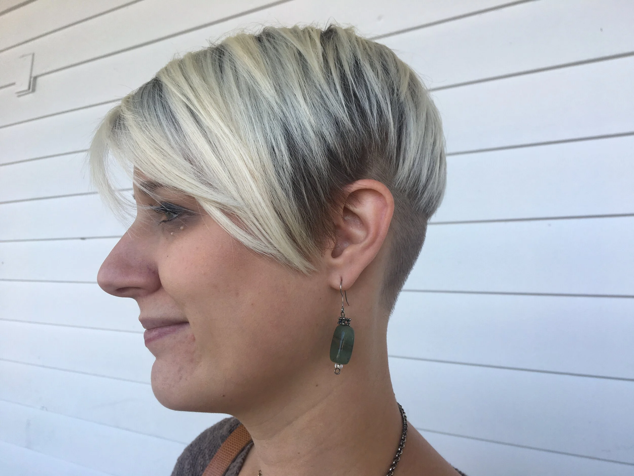 Short stacked shaved undercut blonde growout