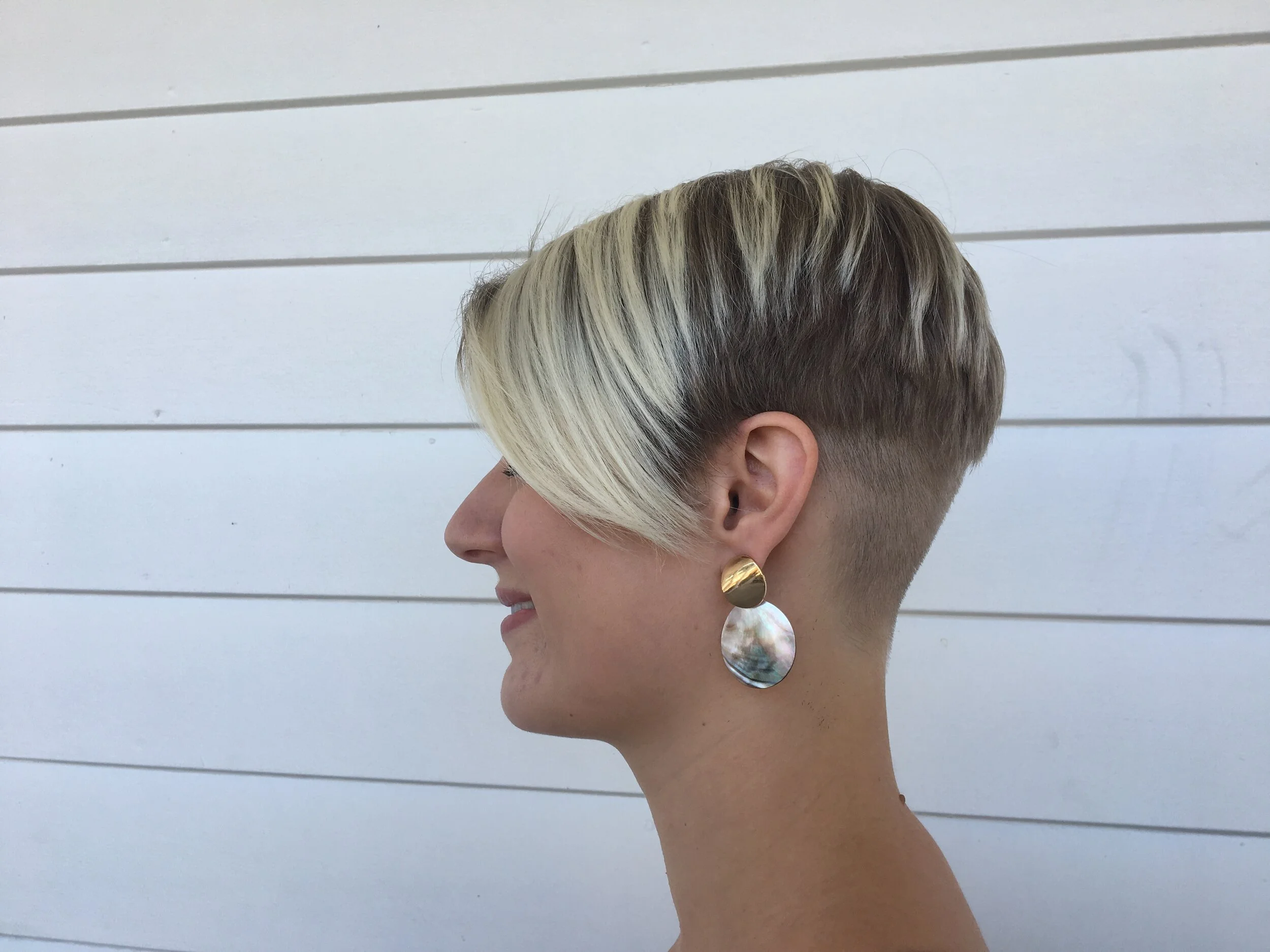 Short blonde shaved blonde grow out