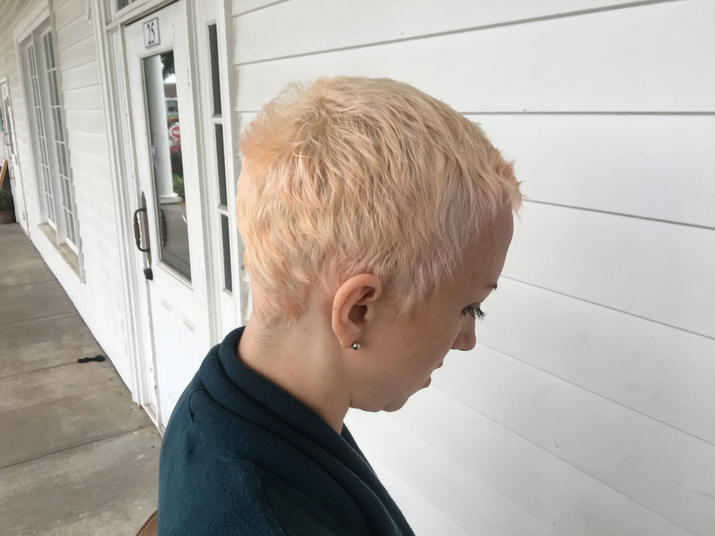 Short pixie blonde pink undertones