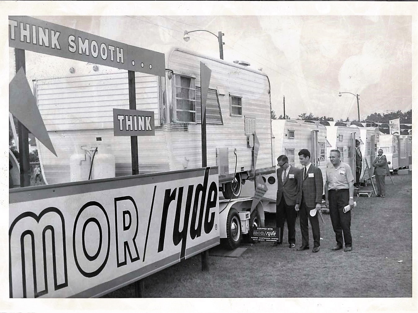   Company founder Bob Moore, Sr., center, selling MORryde Suspension Systems at a Sales Show  