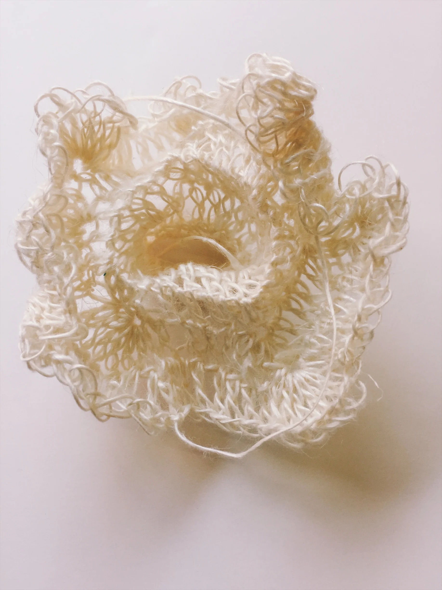 Self-Bracing in the Pseudosphere with a Tunisian Stitch