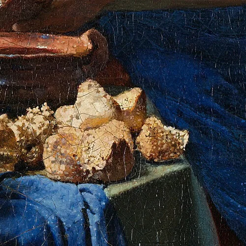 Detail from The Milkmaid by Johannes Vermeer, c. 1660 at the Rijksmuseum, Amsterdam, The Netherlands.