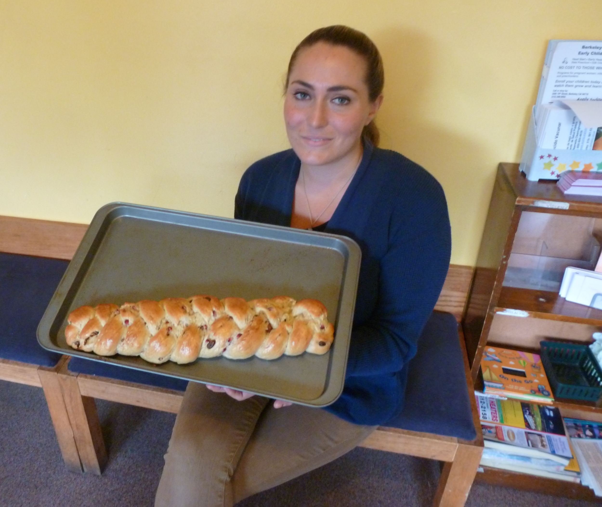 Zoe, the Volunteer Coordinator at the Women's Daytime Drop-In Center. Upon receiving the challah, she spontaneously thanked Aviva for doing "Tikkun Olam," helping to "repair the world."