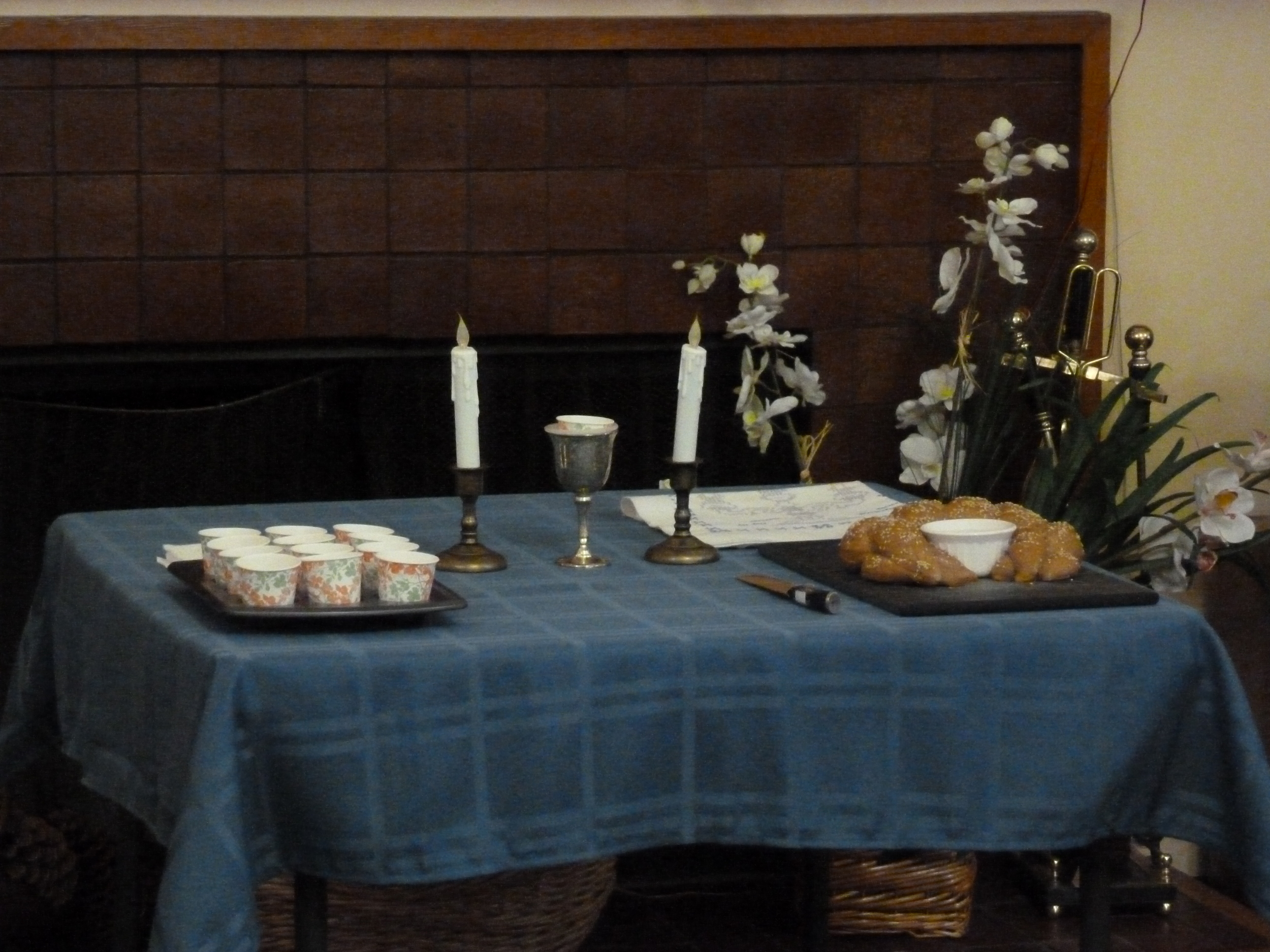 Challah, Kiddush cup, and candles.